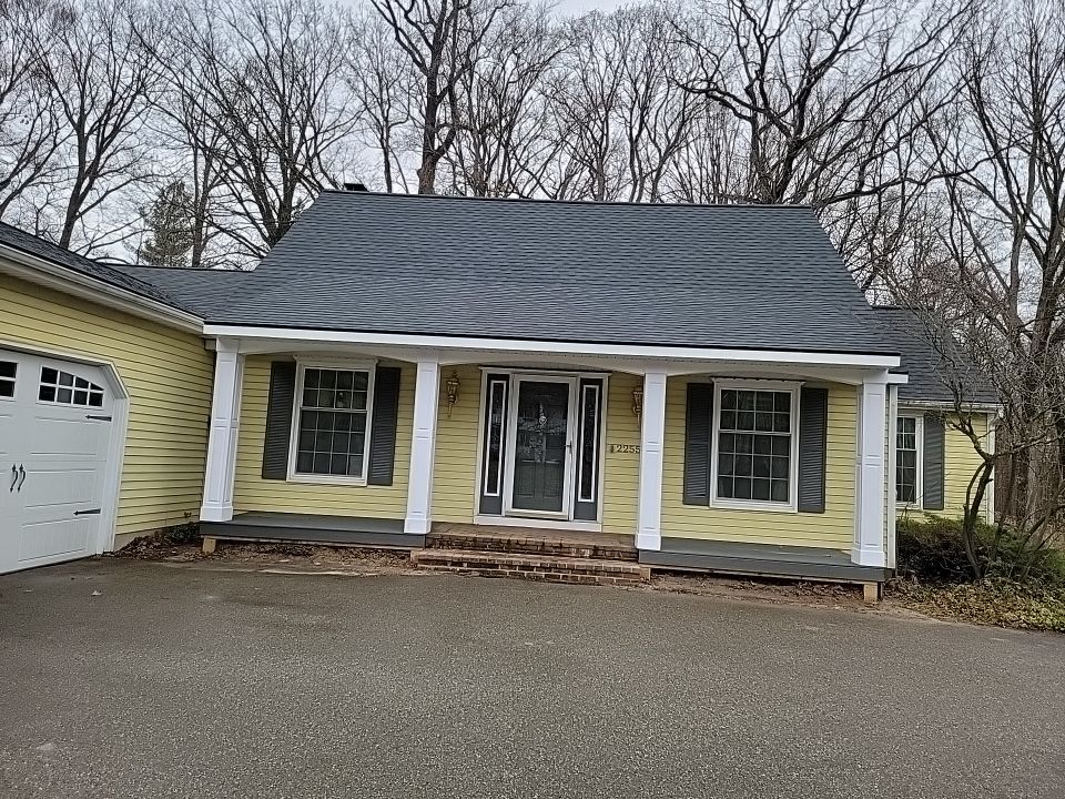 Porch Roof Addition by Avalon Roofing and Exteriors