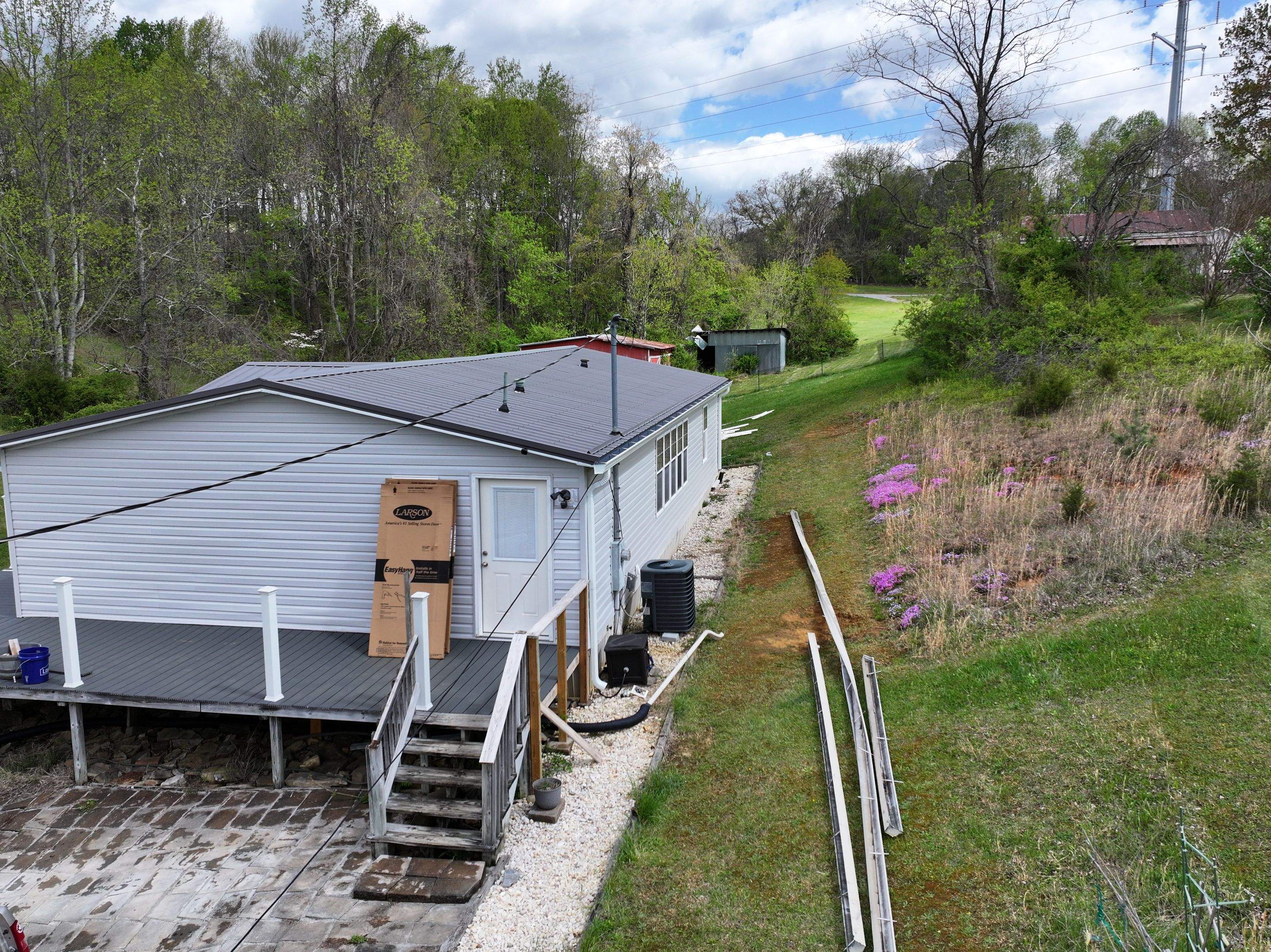Charcoal Gray Textured Metal Roof by Omnia Roofing