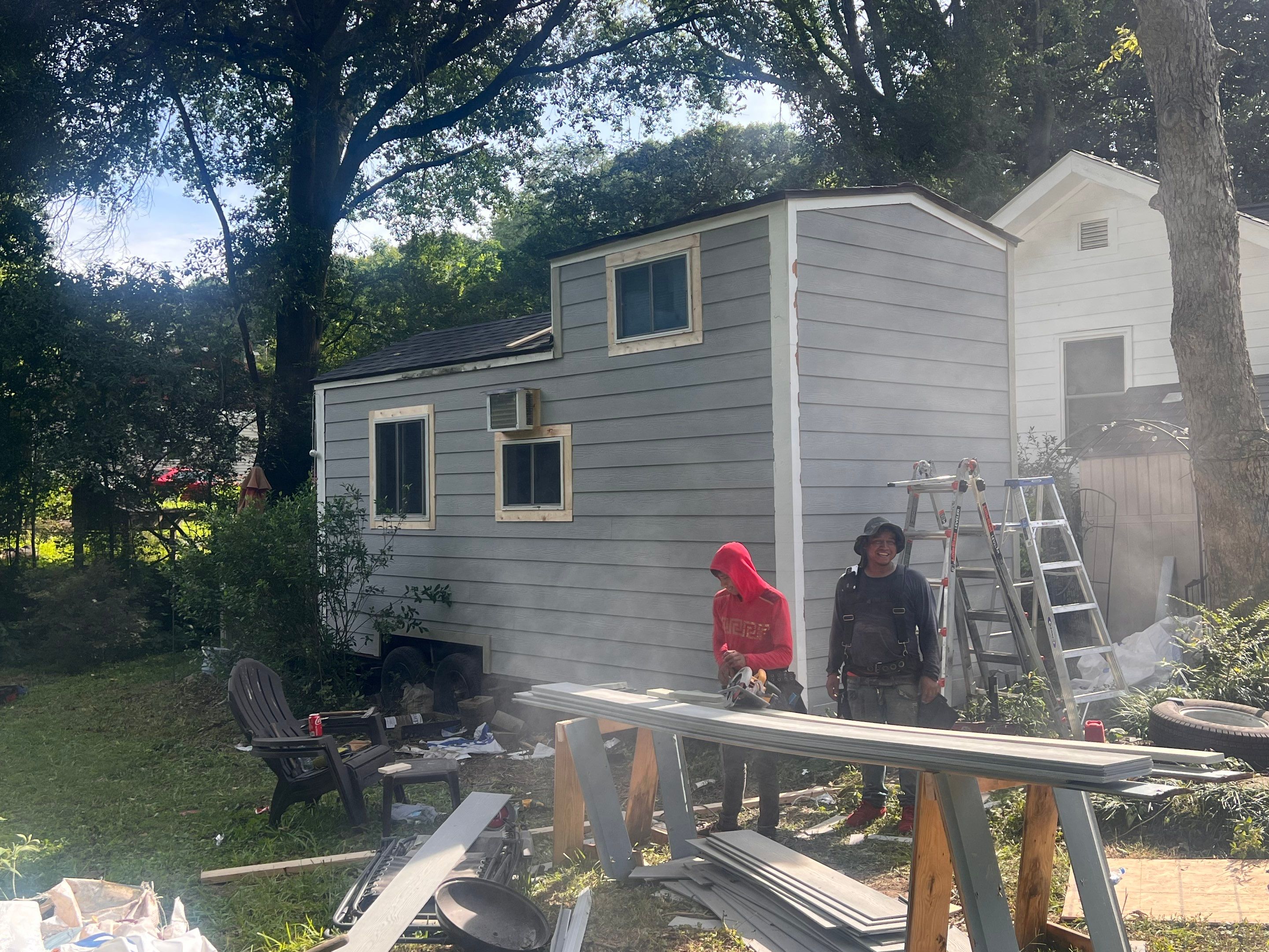 tiny home remodel- siding,paint,roofing by Nailed It Roofing & Remodeling LLC