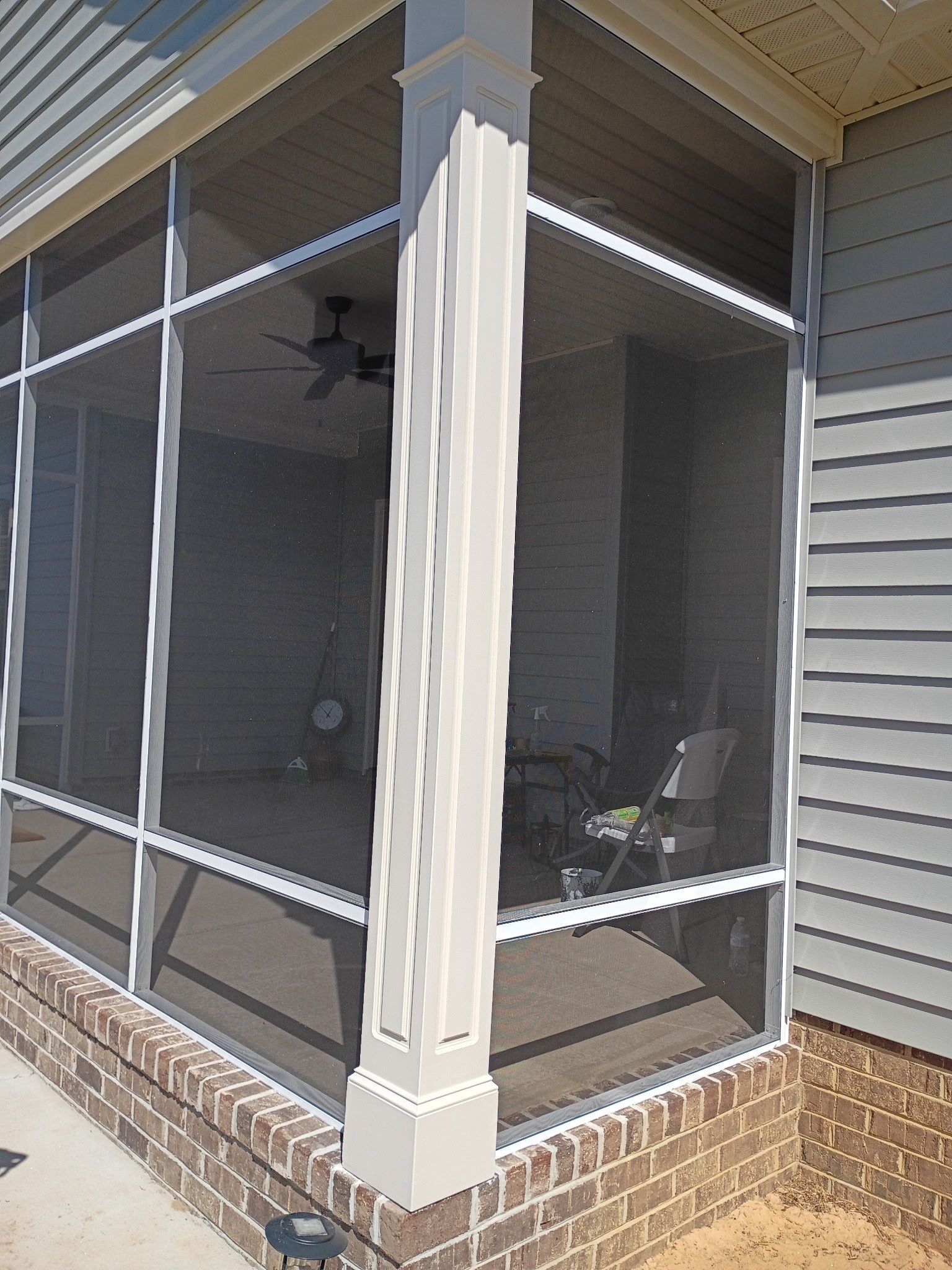 Custom Screened Porch Enclosure and Aluminum Railing in Hope Mills by The Remodeling Company