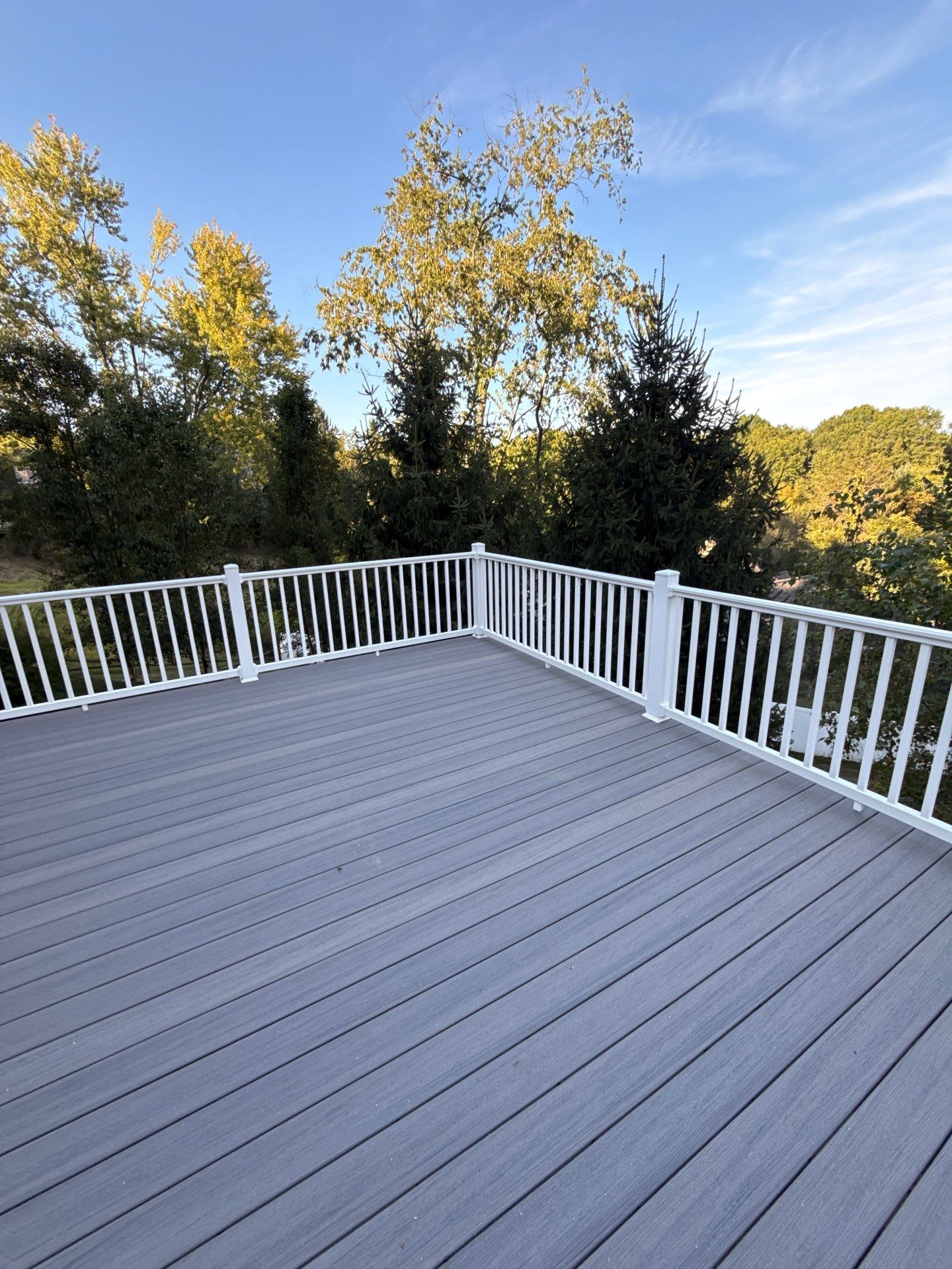 Deck extension  by Cousins Roofing Siding & Decks
