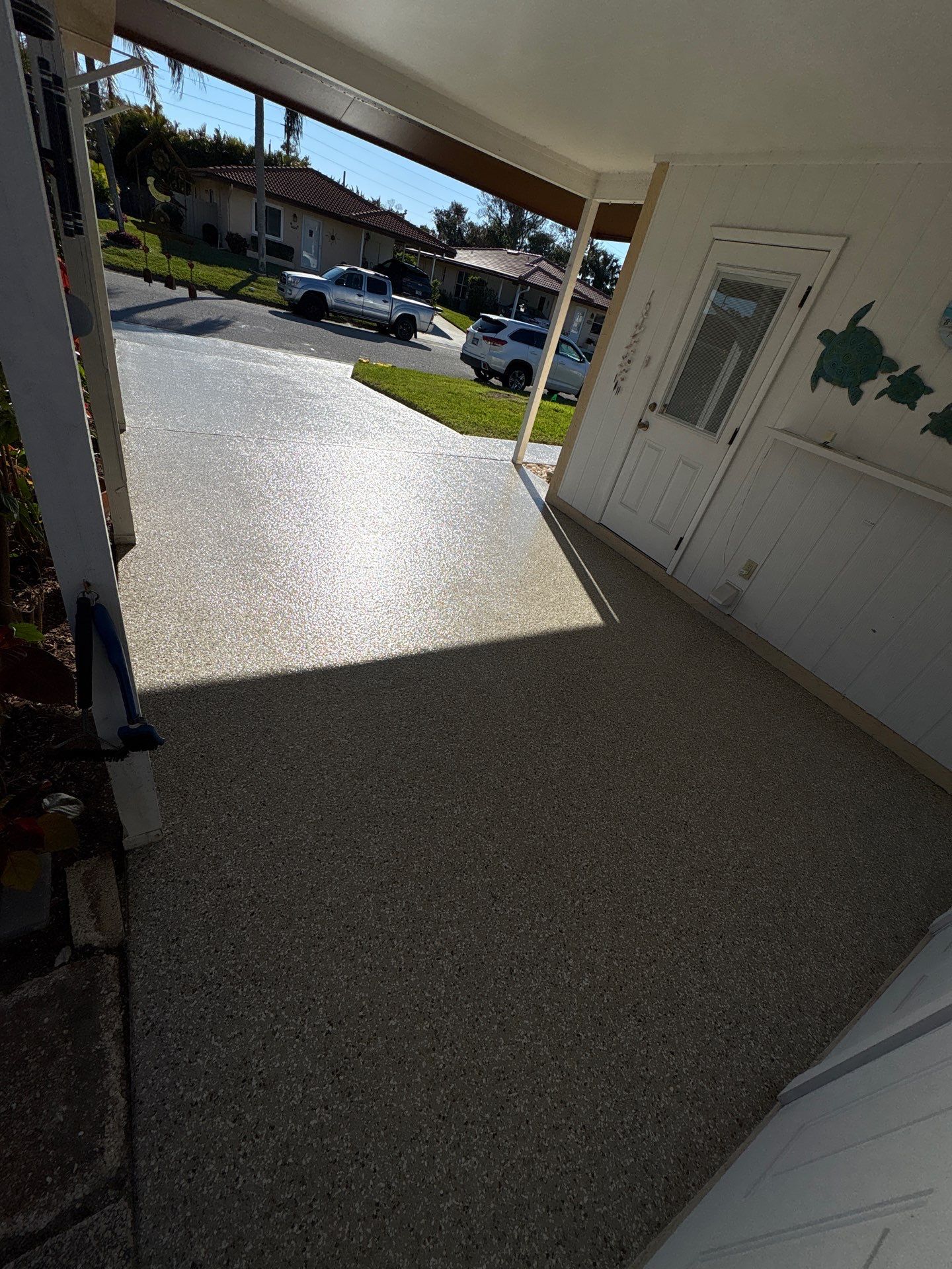 Bradenton, FL Driveway and Patio Epoxy Combination by Performance Floors & Coating