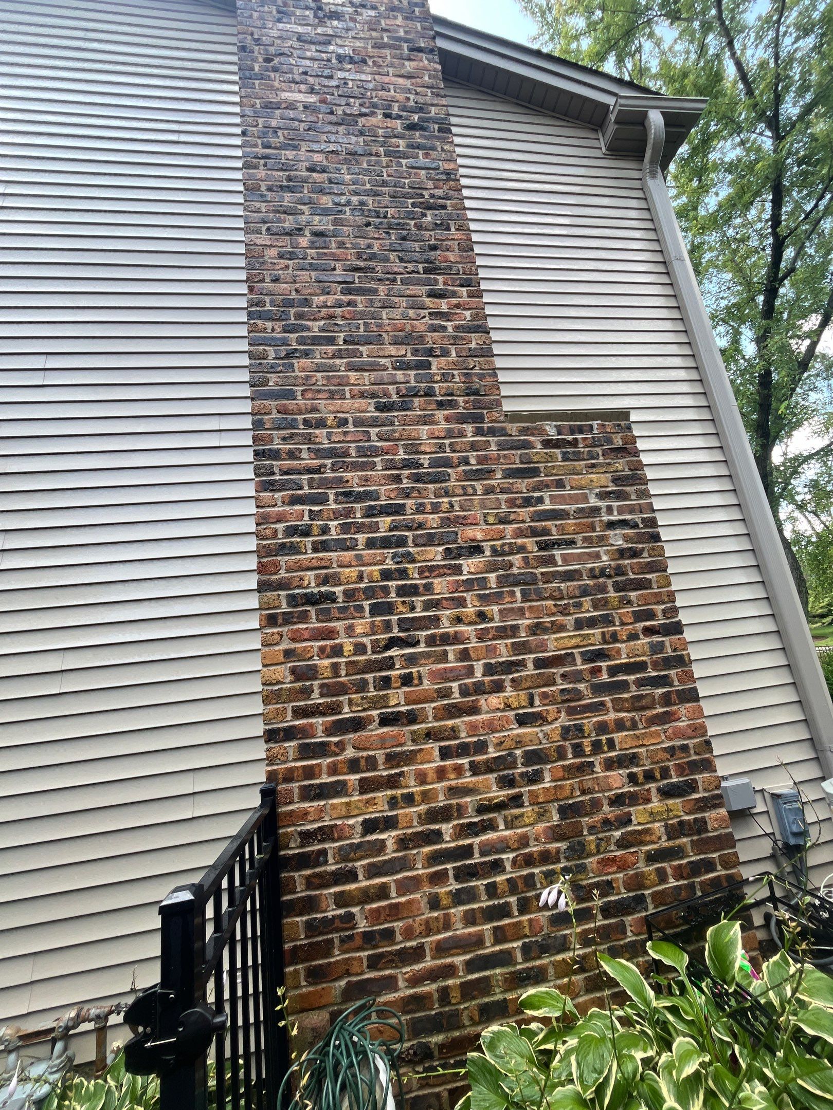 Housewashing  using Algaecide, soft wash soap by Northern Power Washing LLC.