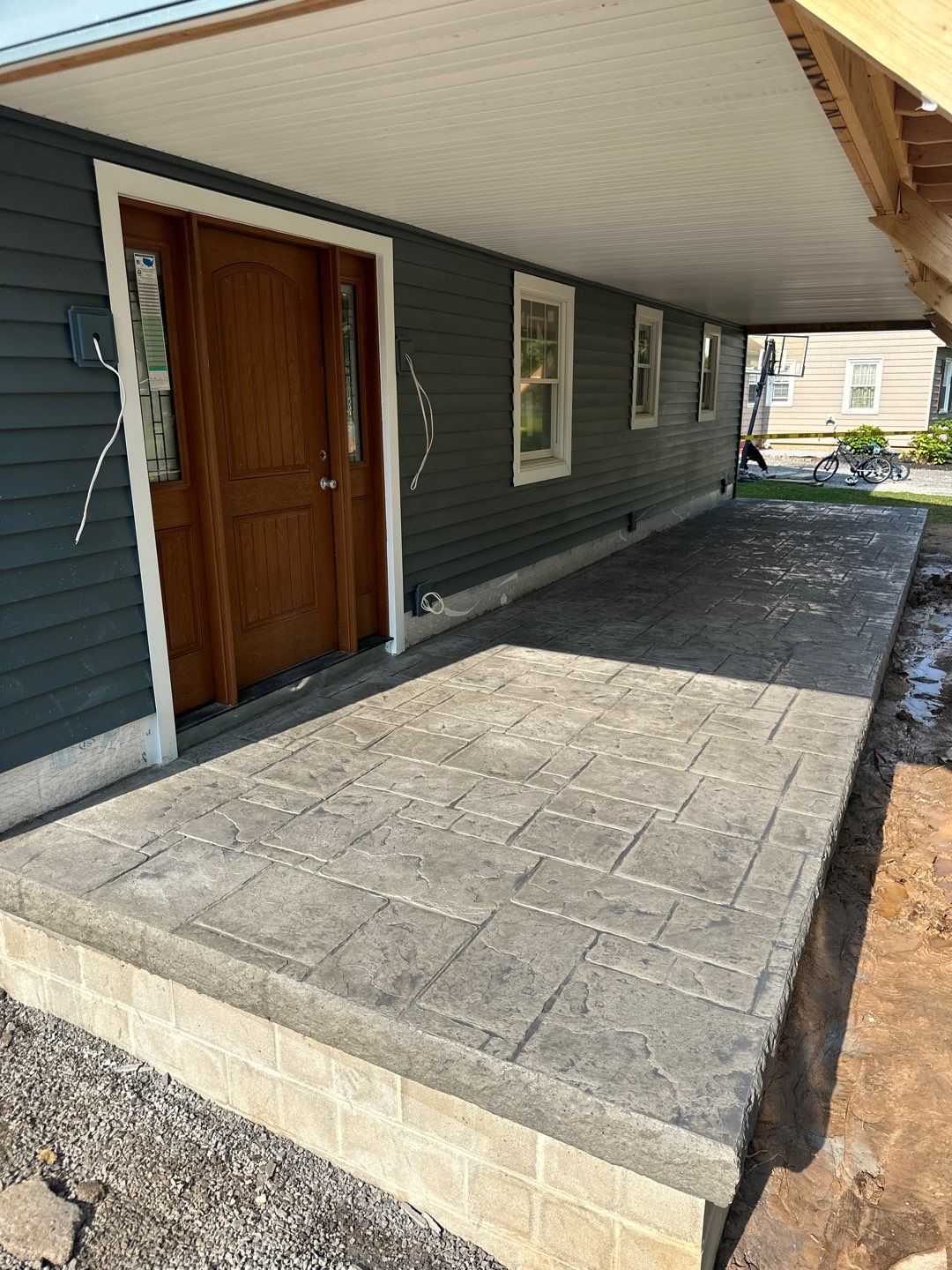 Stamped English Rivenstone concrete Porch/Patio  by NG Masonry & Construction LLC