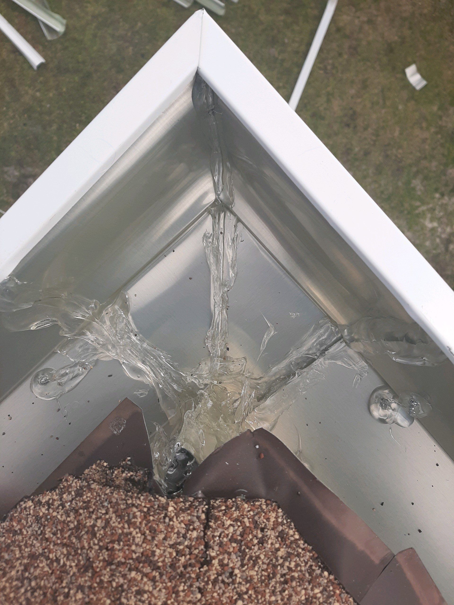 Seamless Gutter Installation using White K-Style Gutters by Gutter Professors