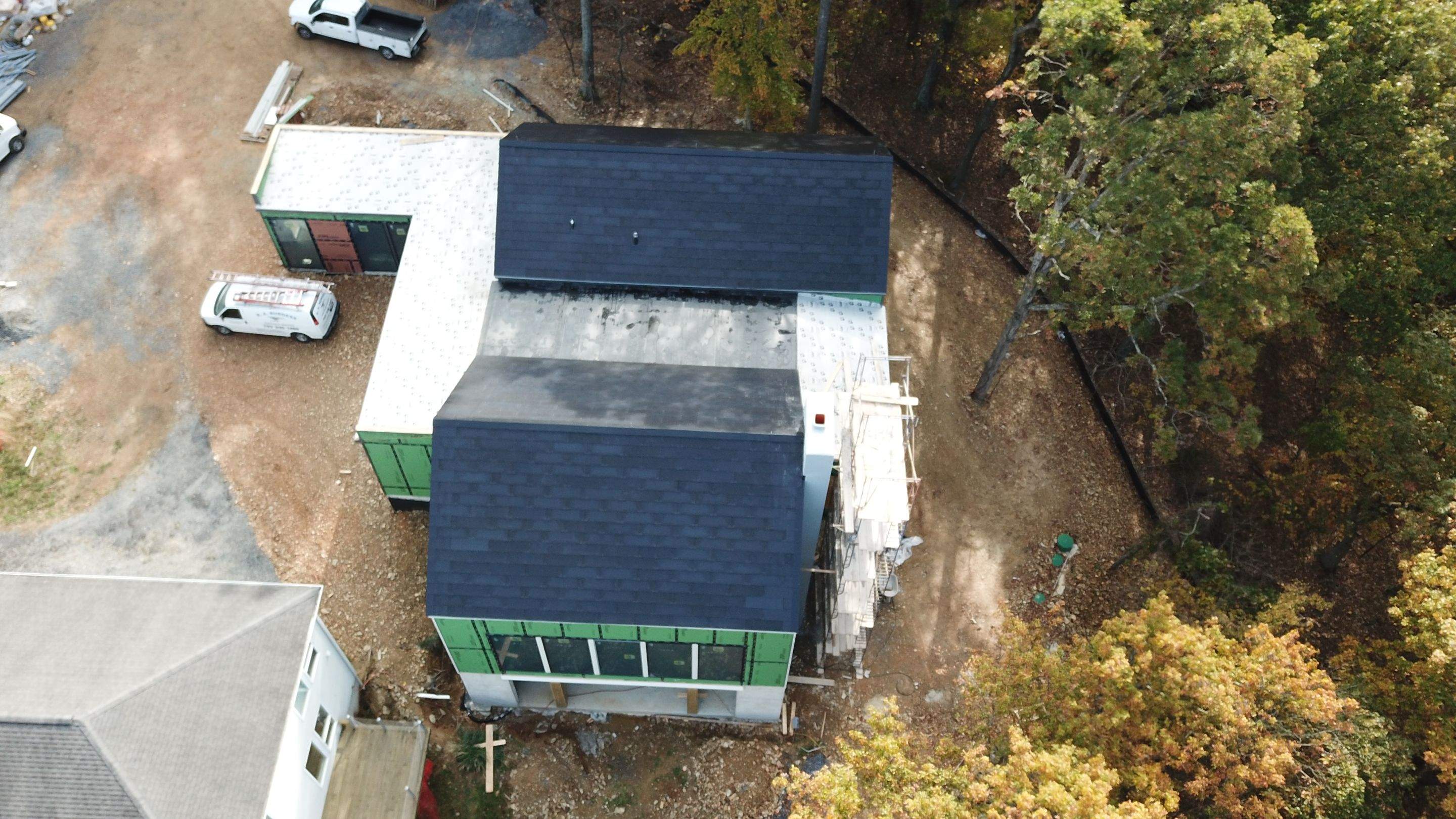 Roof Installation using Tesla Solar Roof V3 by American Home Contractors