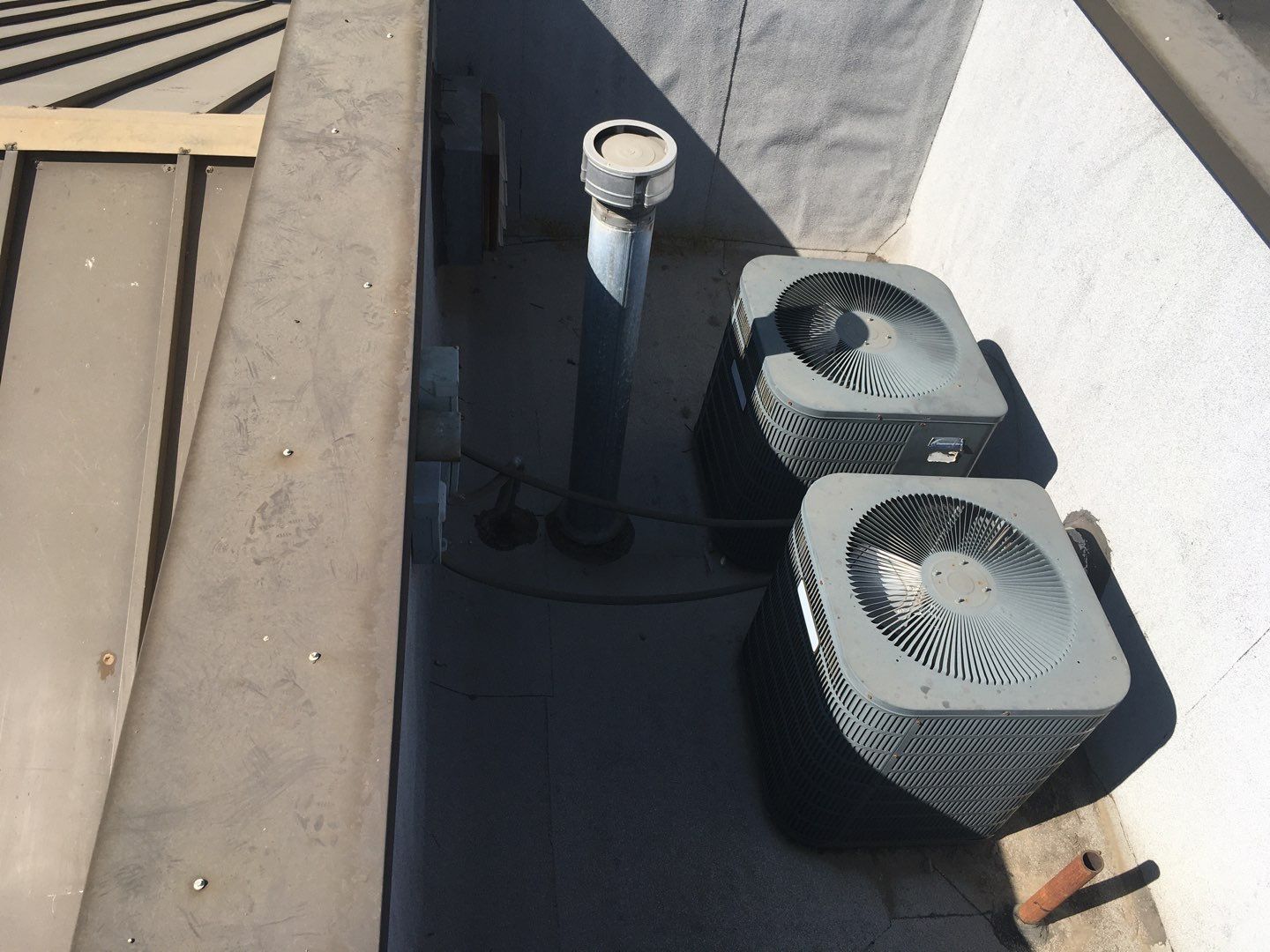 Spray foam and coatings inside commercial building HVAC well using Spray foam and coatings over existing BUR system by Straight Edge Roofing Inc