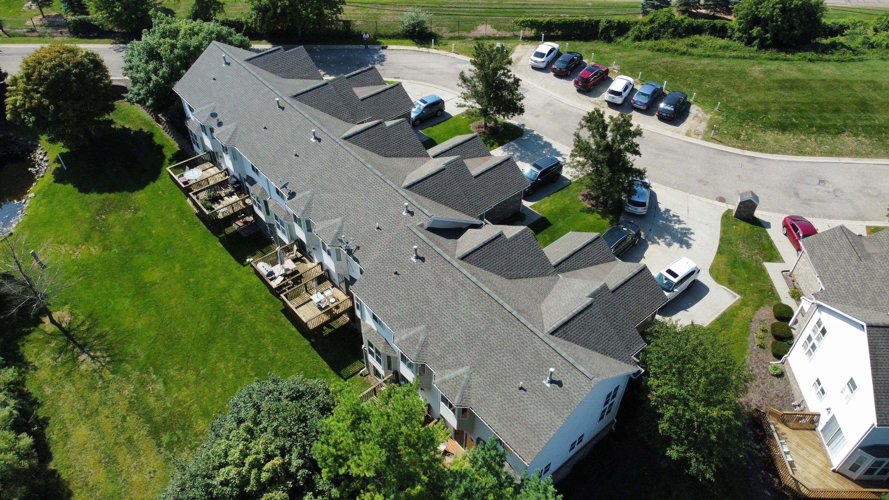 Roof Replacement and Proper Low Slope Installation - Condo Association  by Bloomfield Construction & Restoration