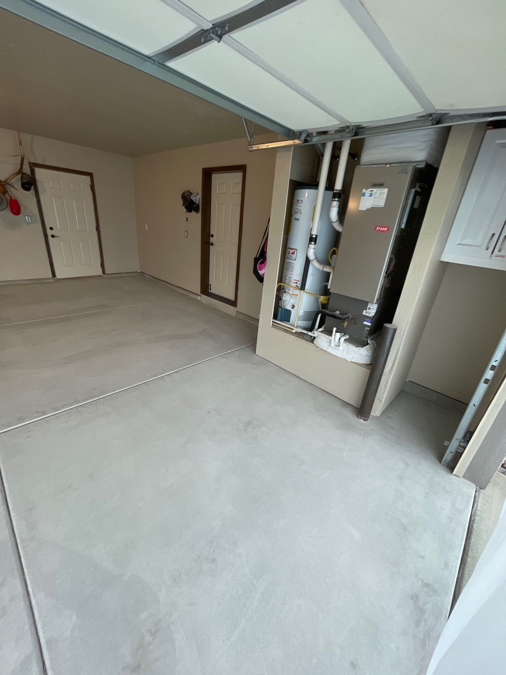 Garage Transformation using Pebble Beach and Front Porch using Greystone by Croc Coatings, LLC