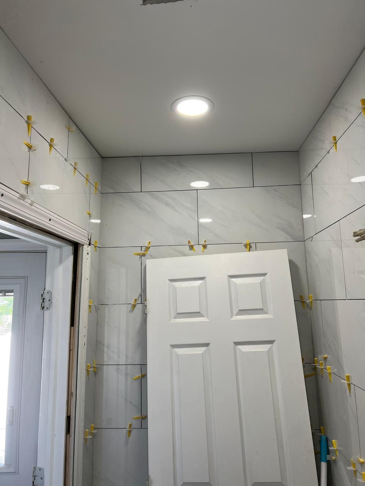 Bathroom Remodel using Tile by Home Concepts Construction