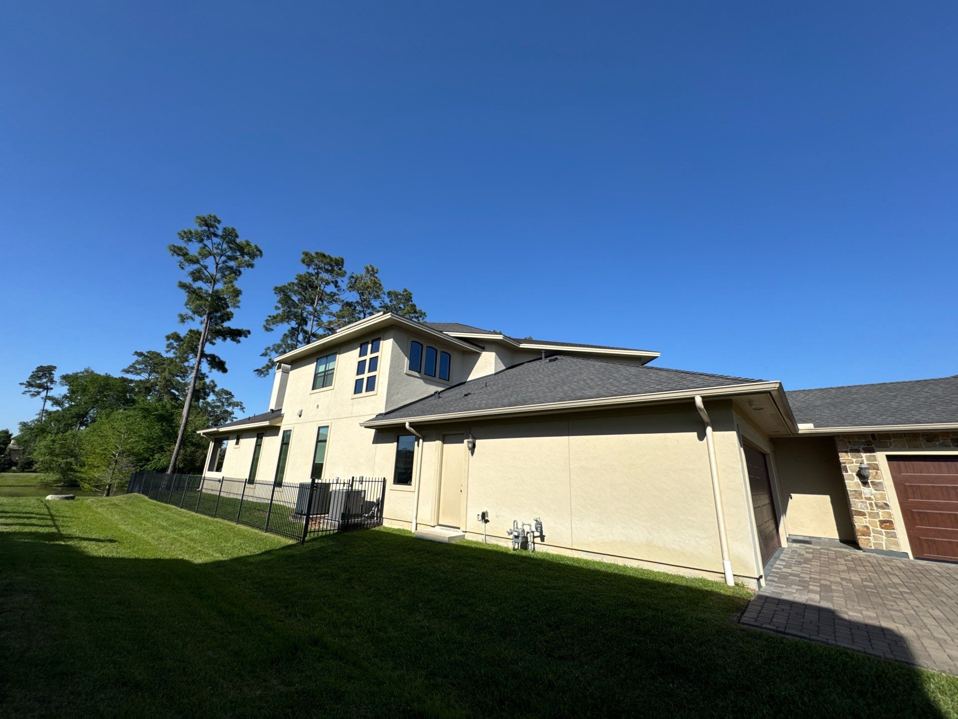 Complete Exterior Painting and Stucco Refinishing in Spring by Rolling Nations