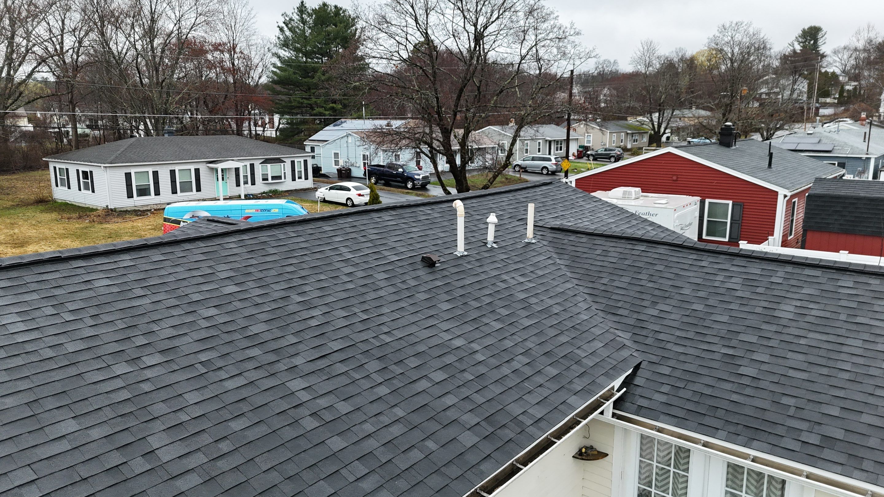 Full Roof Replacement & Complete PVC Trim System in Lowell, MA by Mighty Dog Roofing of Greater Middlesex County
