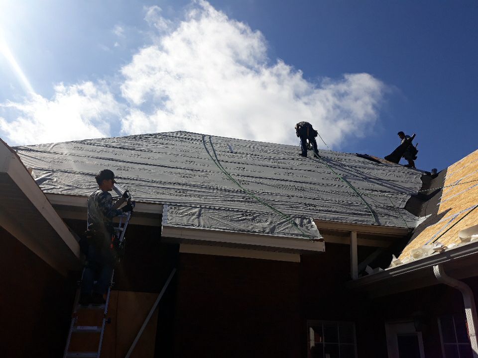 Residential Roofing Installation using Roof Replacement by American Roofing & Construction LLC