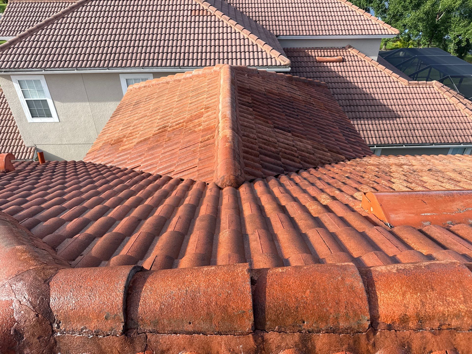 Soft Wash Tile Roof Cleaning in Sonoma Community, Sarasota, FL by Sunshine AquaWash