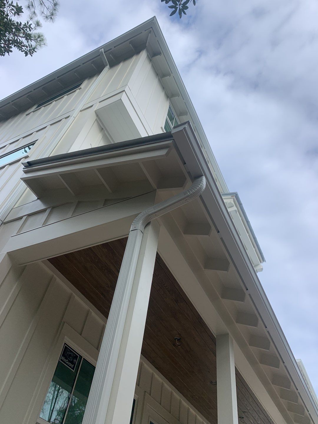 6-inch White Seamless Gutters in Santa Rosa Beach, FL by Gutter Professors