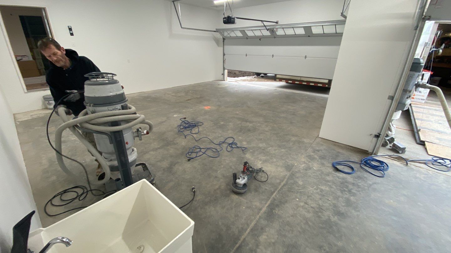 Garage using Cordwood by Select Painting, Coatings & Garage Cabinets