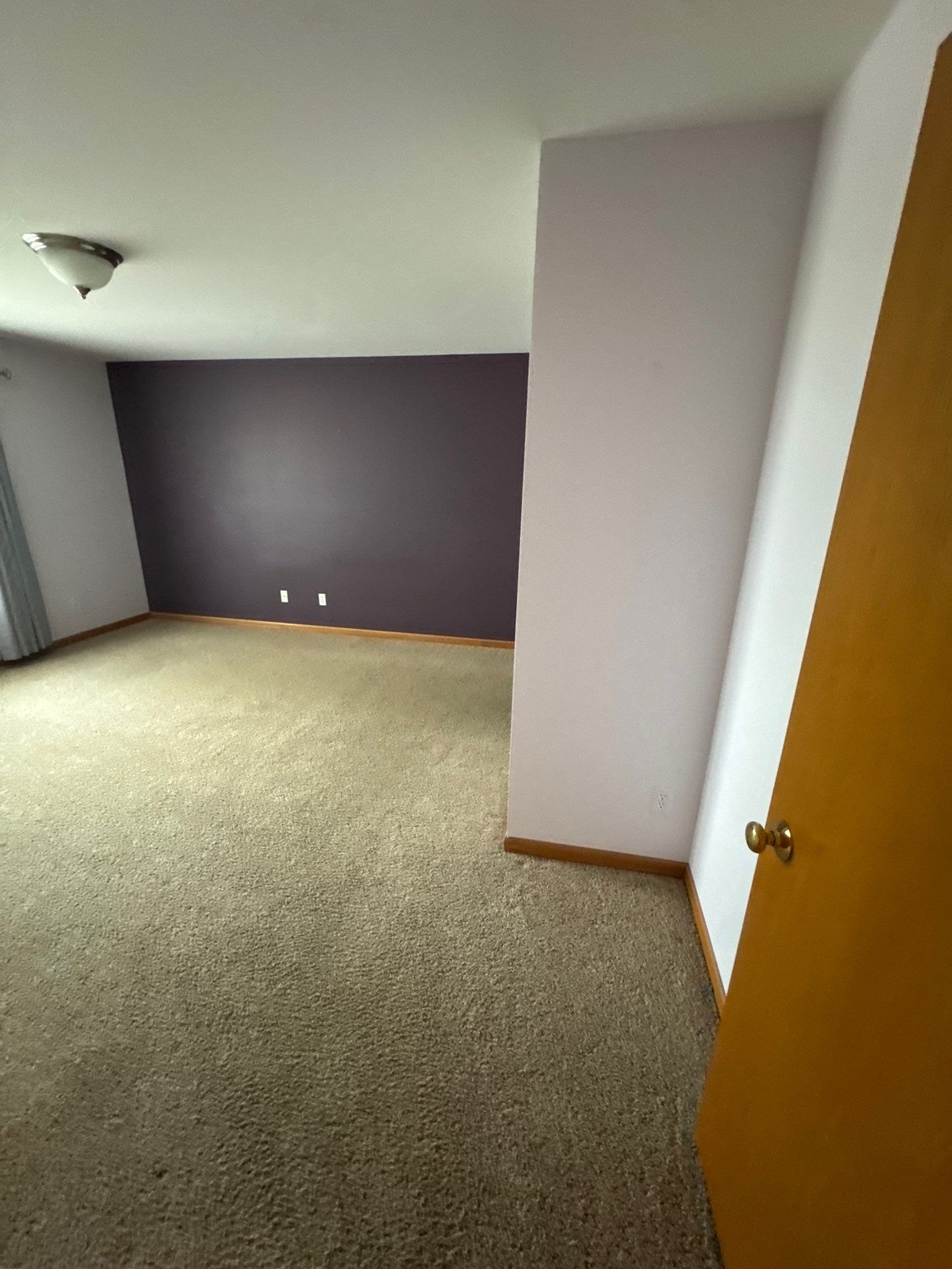 Living Room Wallpaper Removal and Interior Painting by OCS Contracting Services