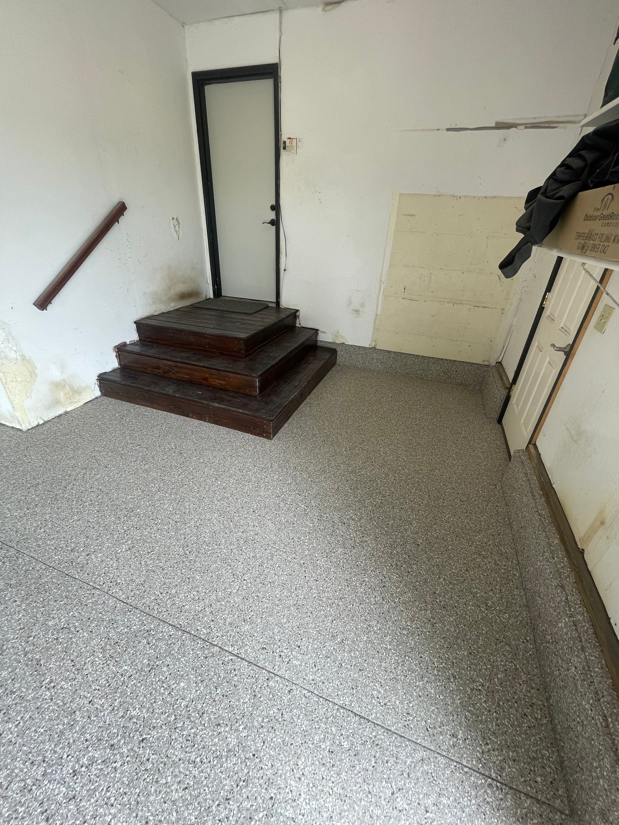 Hartford Residential Garage Floor Transformation With Decorative Chip Coating by Select Painting, Coatings & Garage Cabinets
