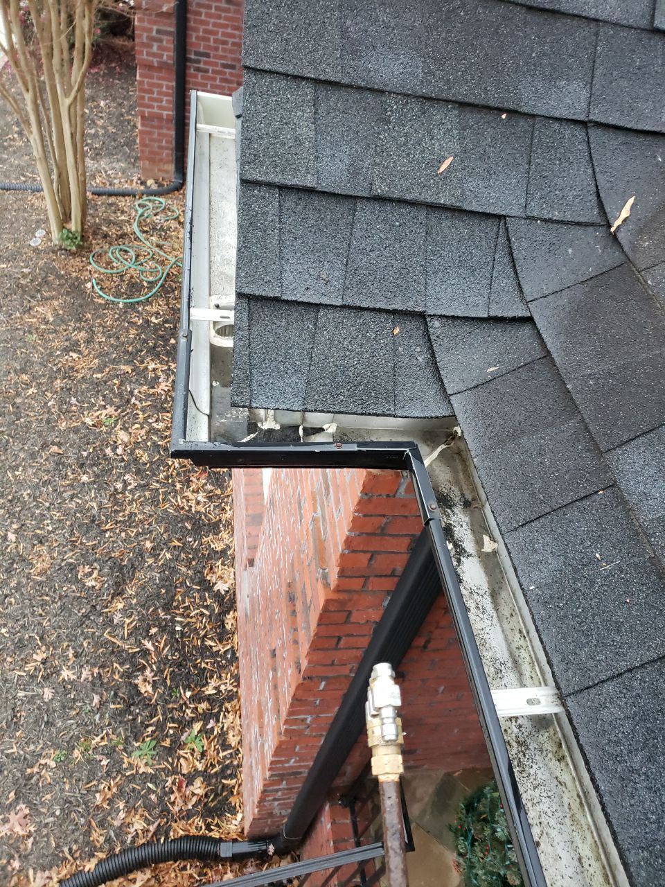 Gutter Cleaning using water by Power Wash Masters LLC
