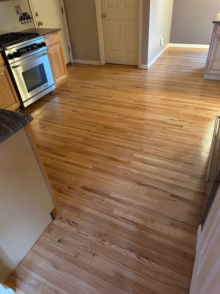 Red Oak Refinish using Duraseal Natural Stain with Semi Gloss Finish by Footprints Floors Morristown