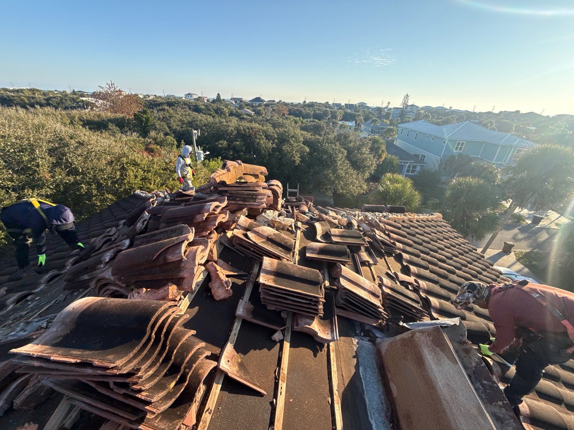 Flagler Beach Residential Tile Roof Replacement with Dark Barrel Tiles by Fortified Roofing Solutions Corp.