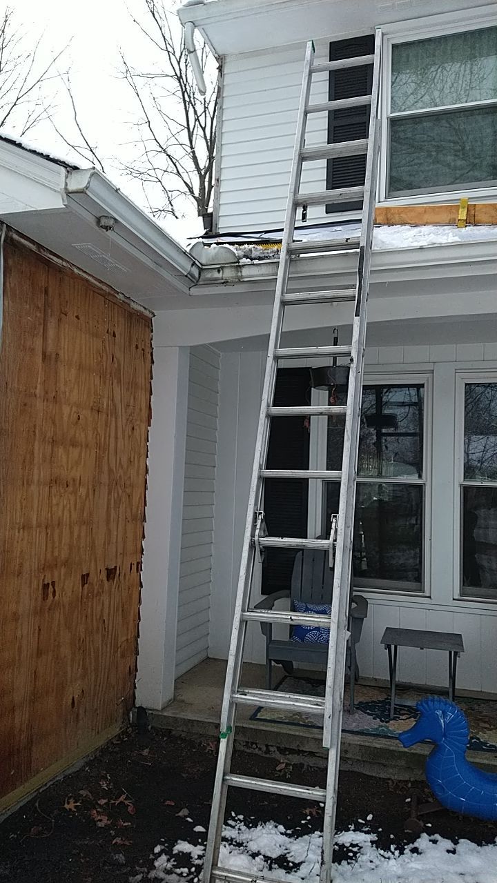 James Hardie Siding  using James Hardie Board and Batten, White by Absolute Roofing and Construction