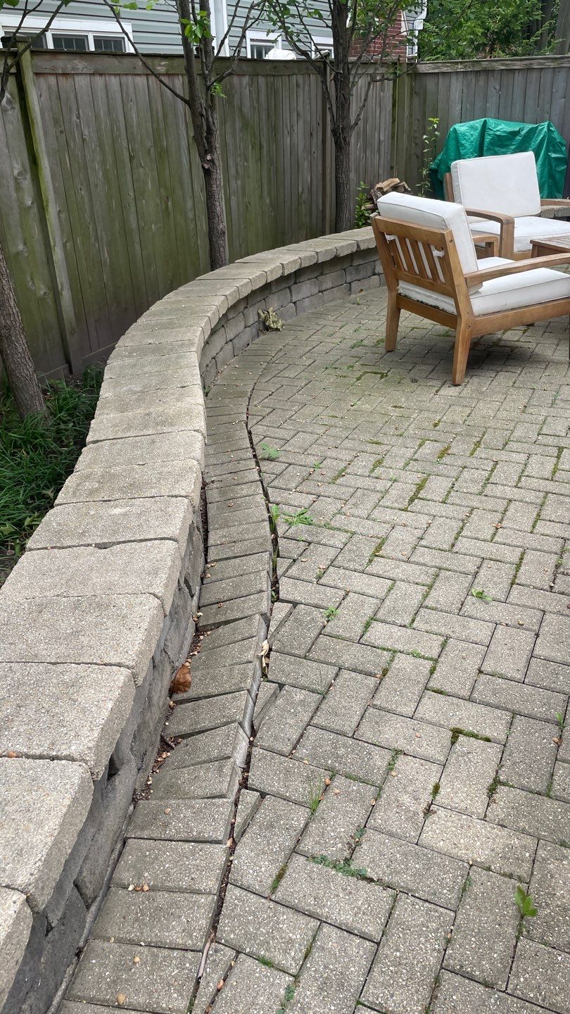 Brick patio repair, clean sand and seal by Northern Power Washing LLC.