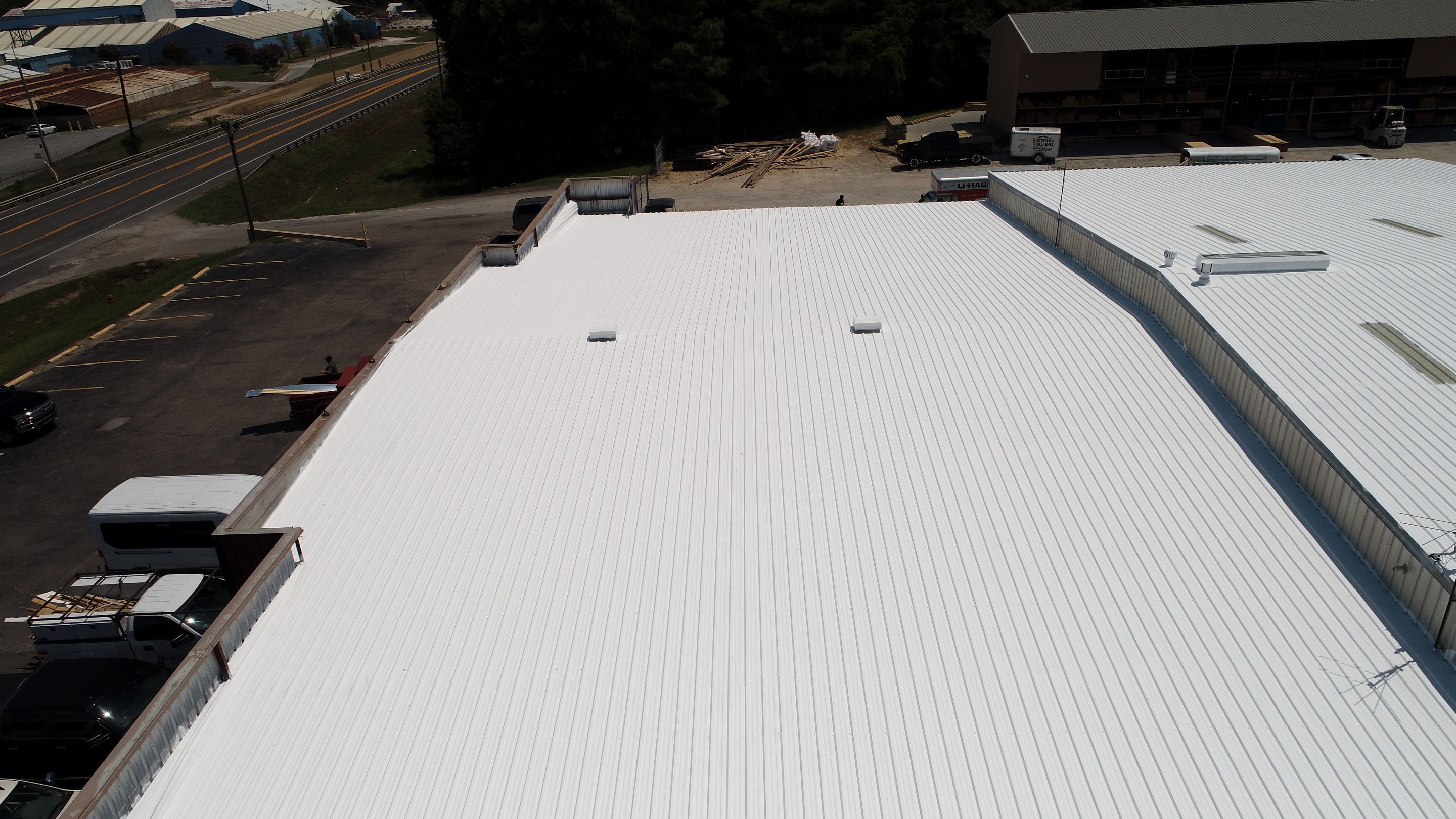 Commercial Roofing Installation using Aldocoat Coatings by Hostetler Roofing