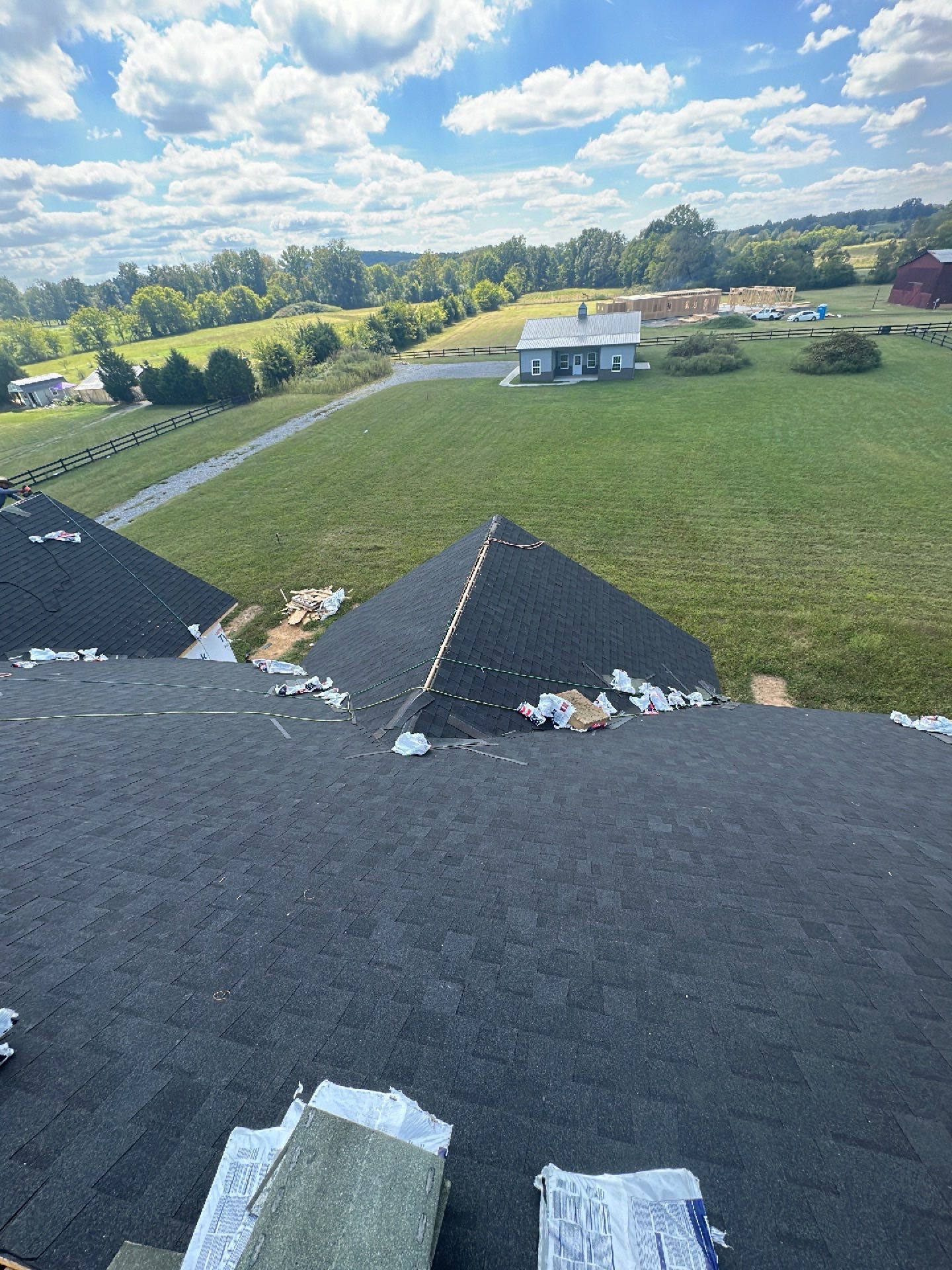 Residential Roofing Installation using Tamko Heritage AR with Standing Seam Metal Porch by Undersun Roofing 