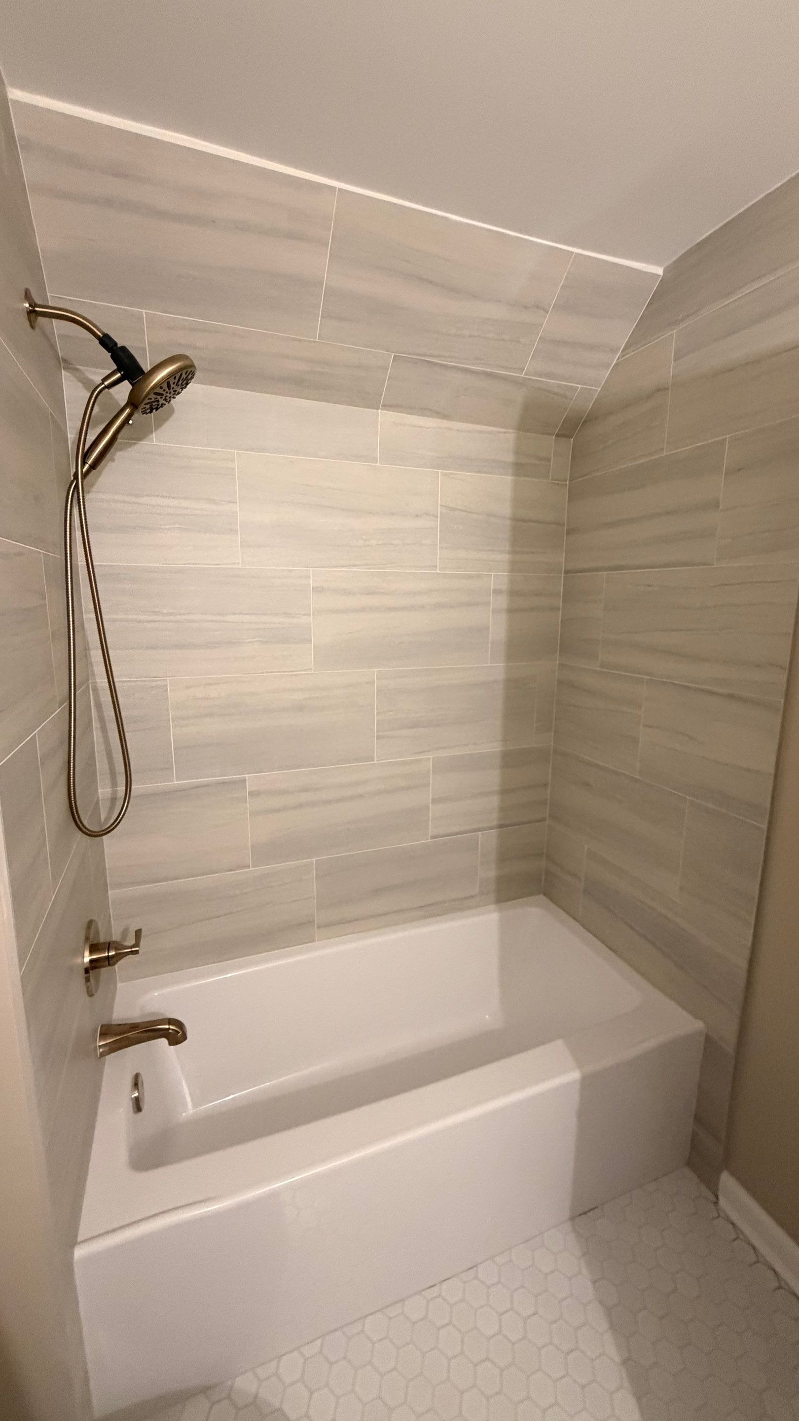 Modern Bathroom Remodel With Quartz Countertops and Hexagonal Tile in Acworth by Swift Home Renovations