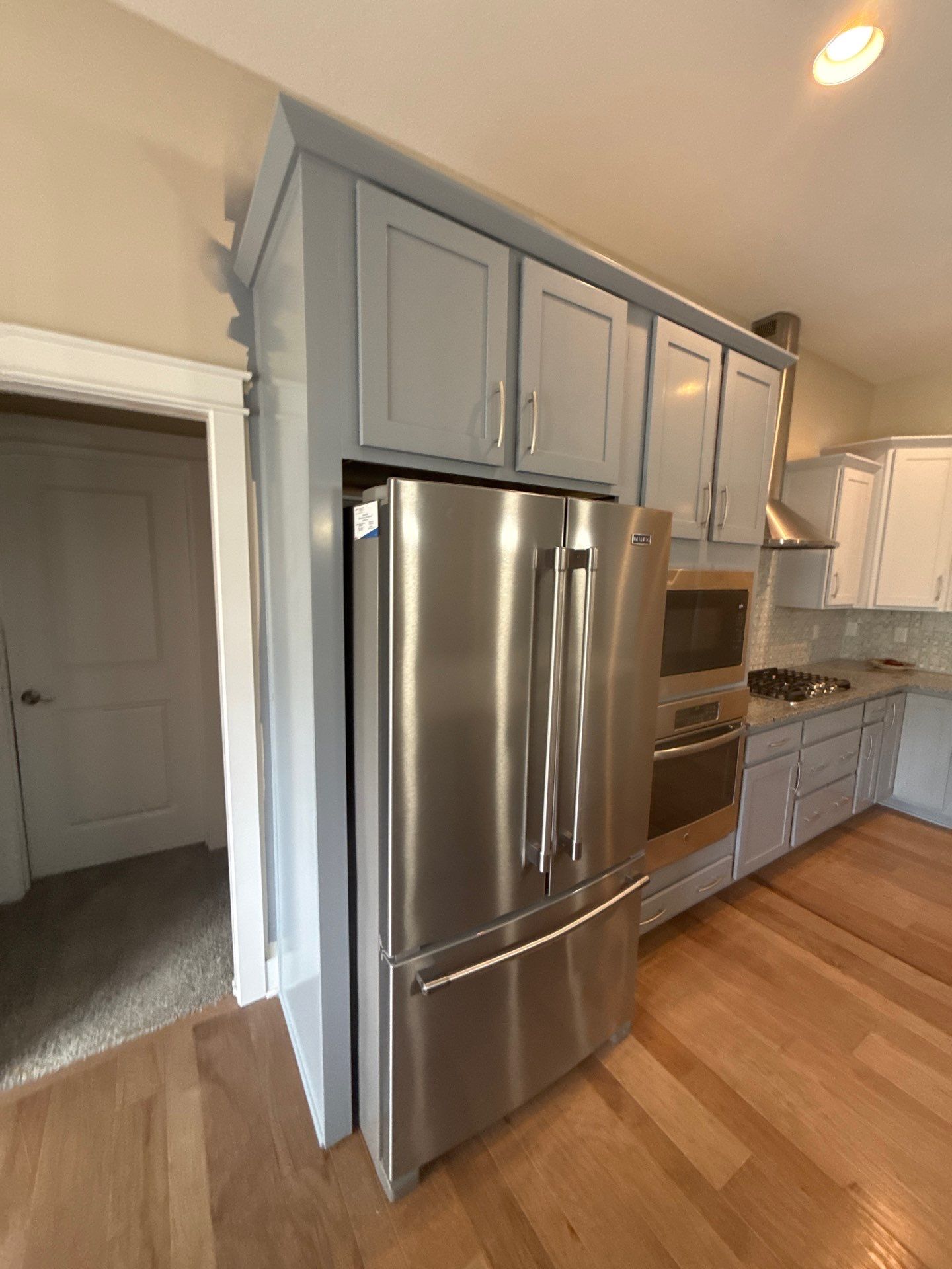 Residential Interior Repaint Color Change on Walls and Cabinets by Midwest Paint LLC