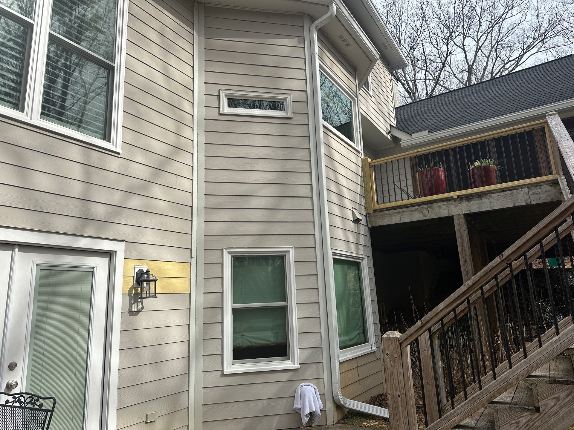 Stucco and Siding Exterior Painting using Sherwin Williams SuperPaint by Nelson Exteriors 