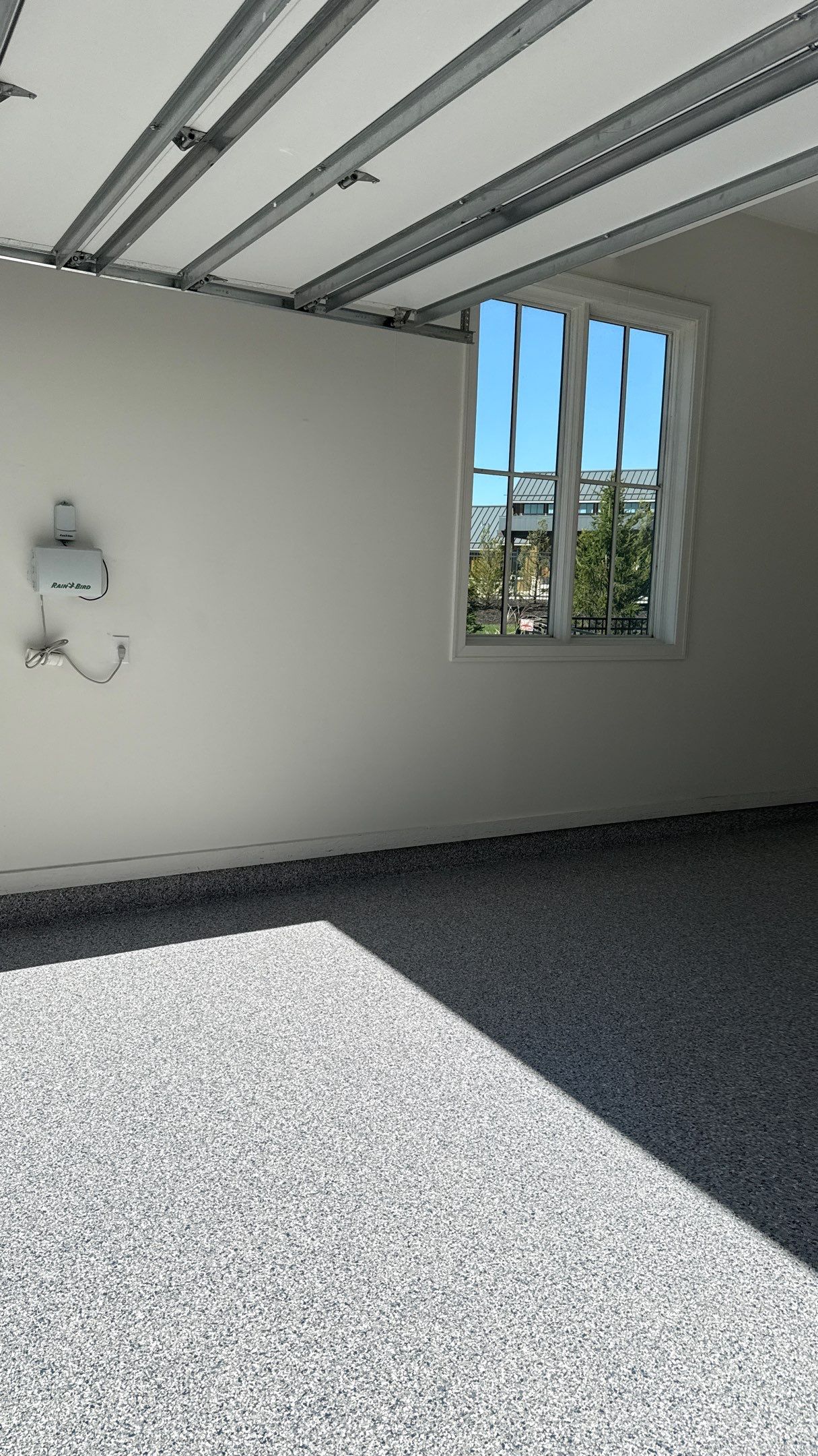 Garage Remodel with Custom Cabinets and Epoxy Floors in Overland Park by Banner Garage