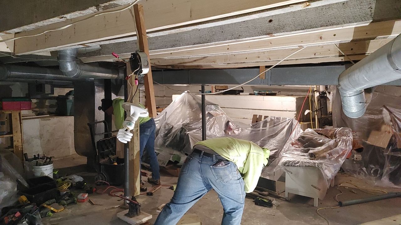 Structural Wood Reinforcement using Structural Wood and Steel Reinforcements (Main Floor Joist) by Toledo Basement Repair