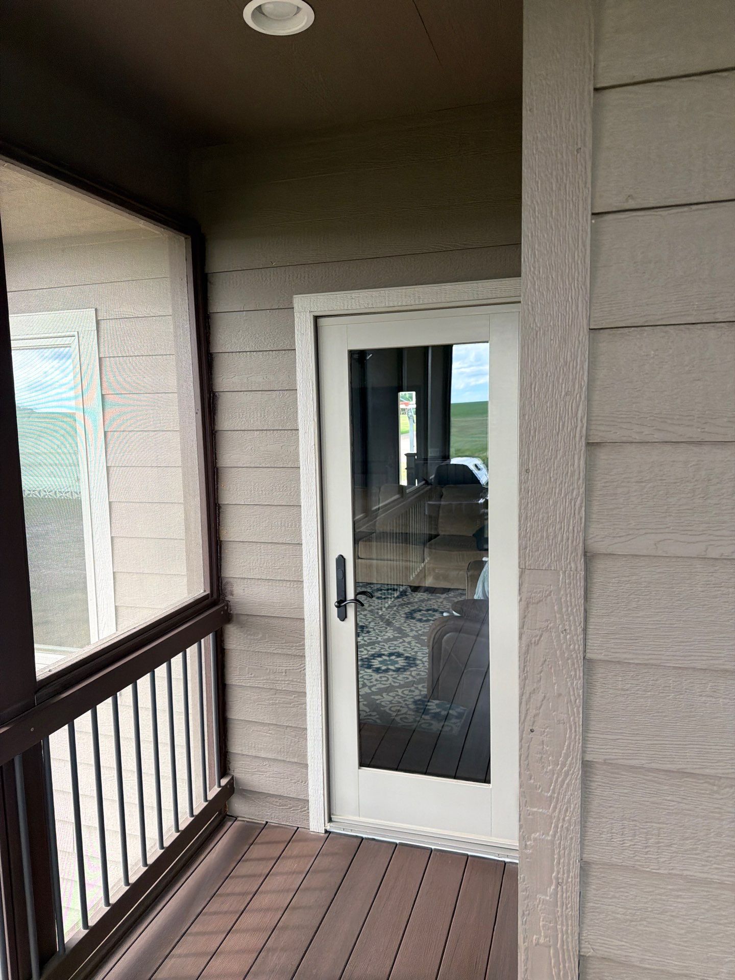Full Exterior Siding Paint Restoration and Refresh in Garretson by Select Painting, Coatings & Garage Cabinets
