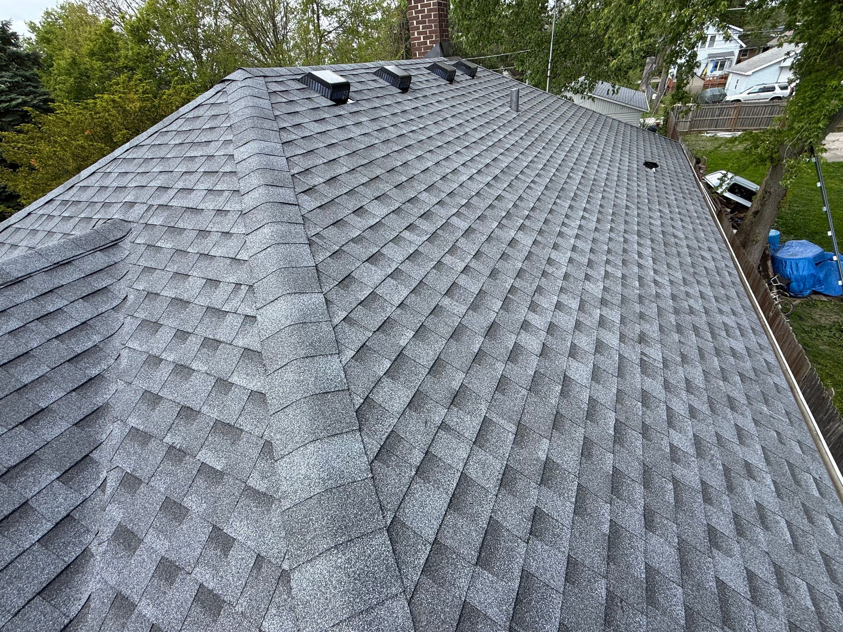 Roof replacement by Optimal Home Improvement 