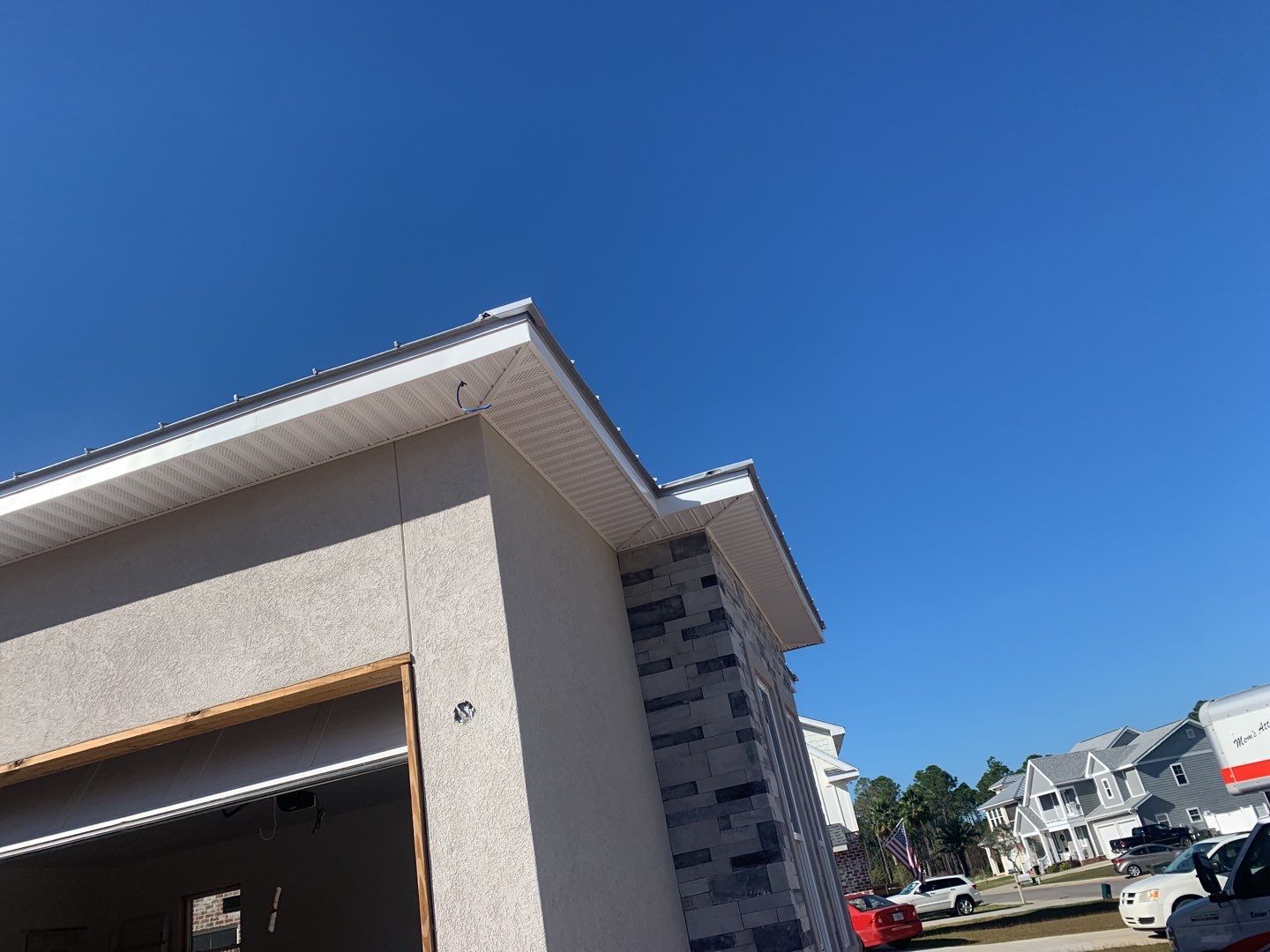 Soffit and Fascia Installation using White Vinyl Soffit in Pensacola FL by Gutter Professors