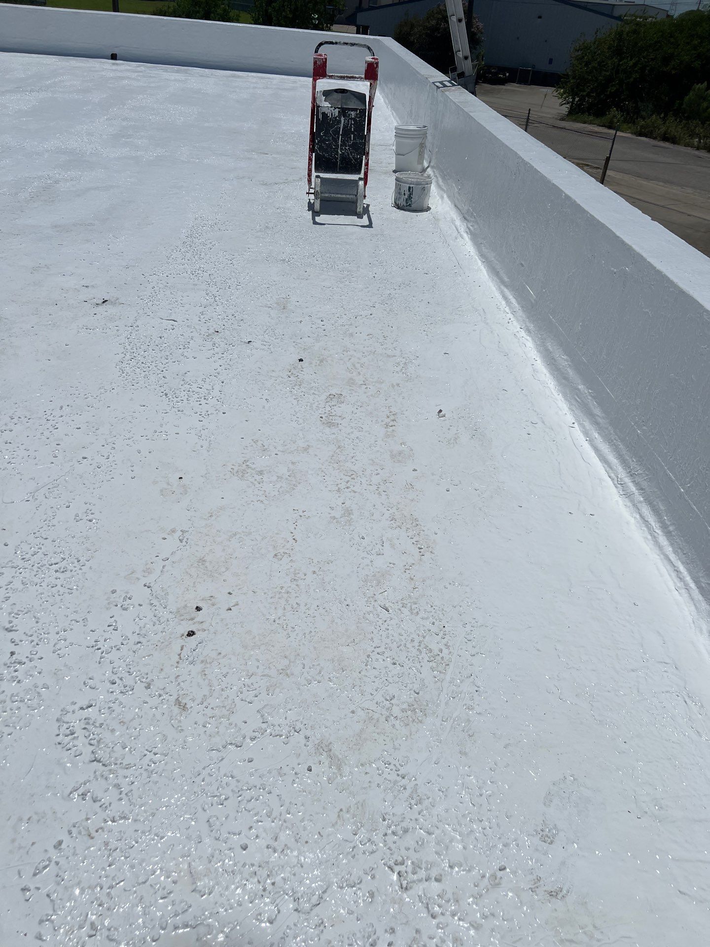 Dirty leaking Gravel Roof by Bayfront Roofing and Construction