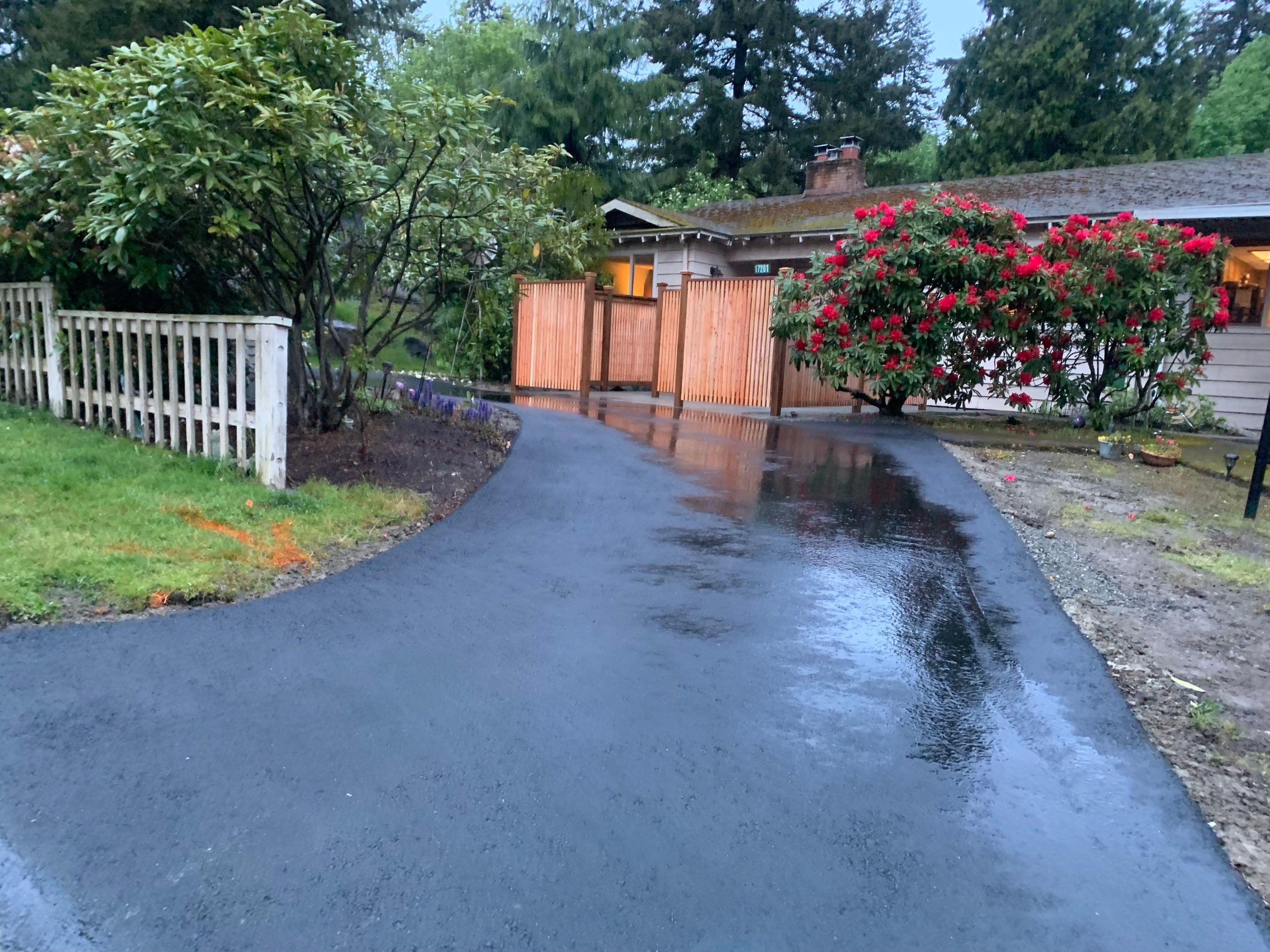 Modern Entry Fence by Jireh Asphalt & Concrete Inc 