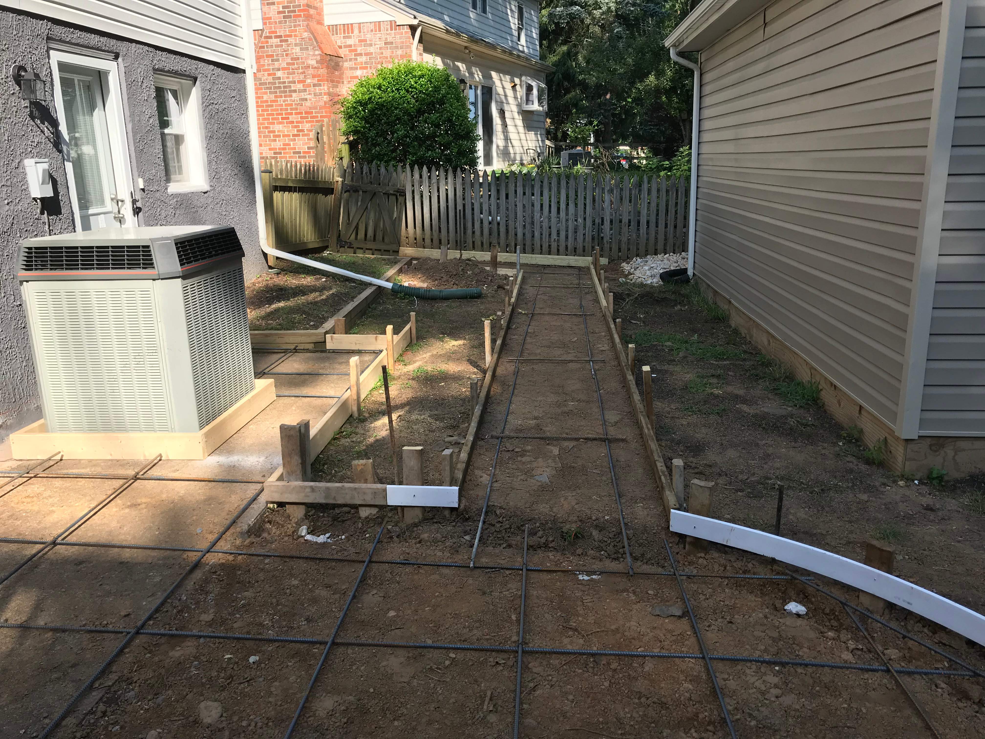 Exterior Repair using Concrete Pad/ walkway by Alpha Design Services