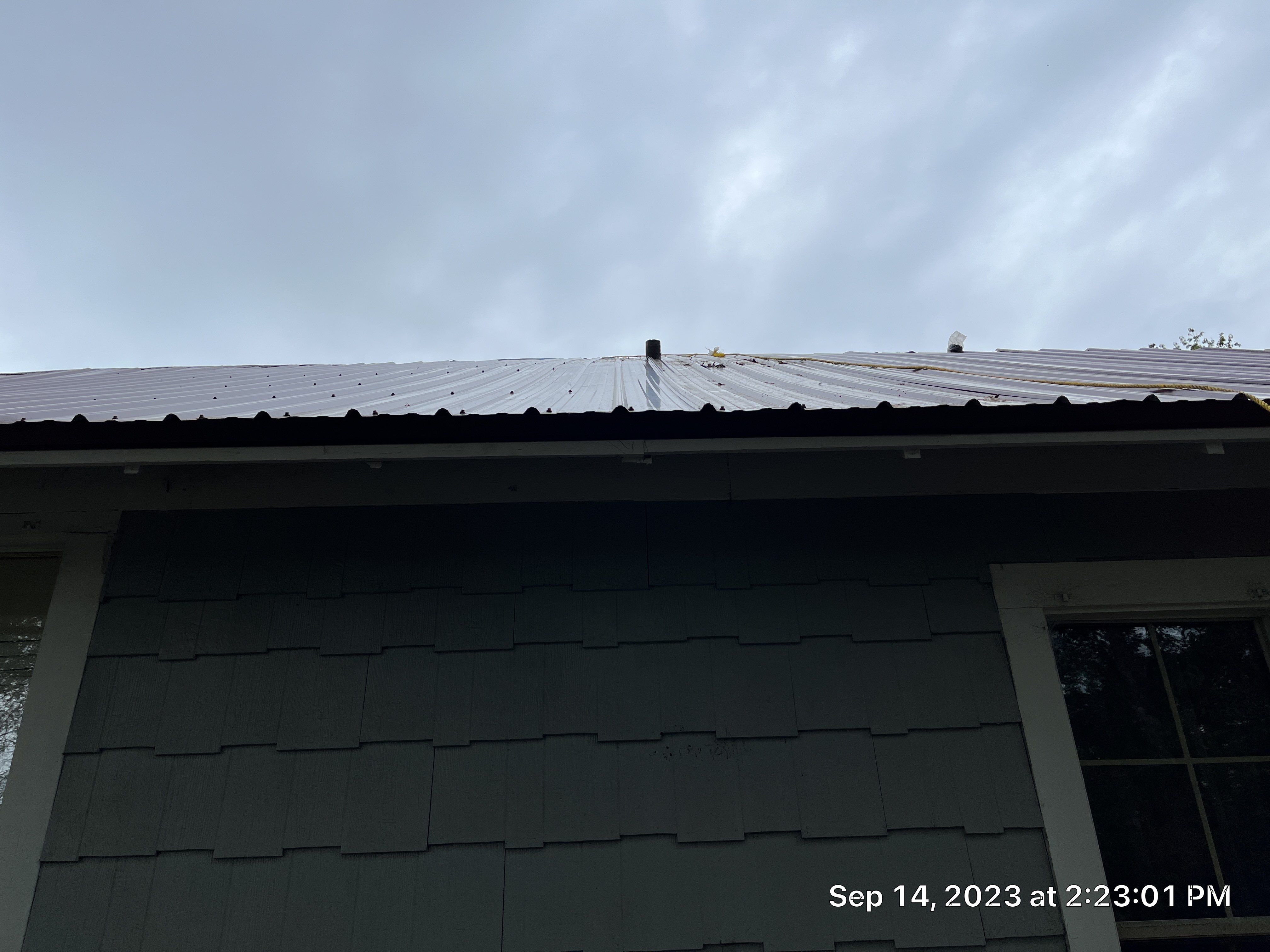 Residential Metal Roof Replacement using Reed's Metals: Colored Residental Panel (Burgundy) by Hostetler Roofing