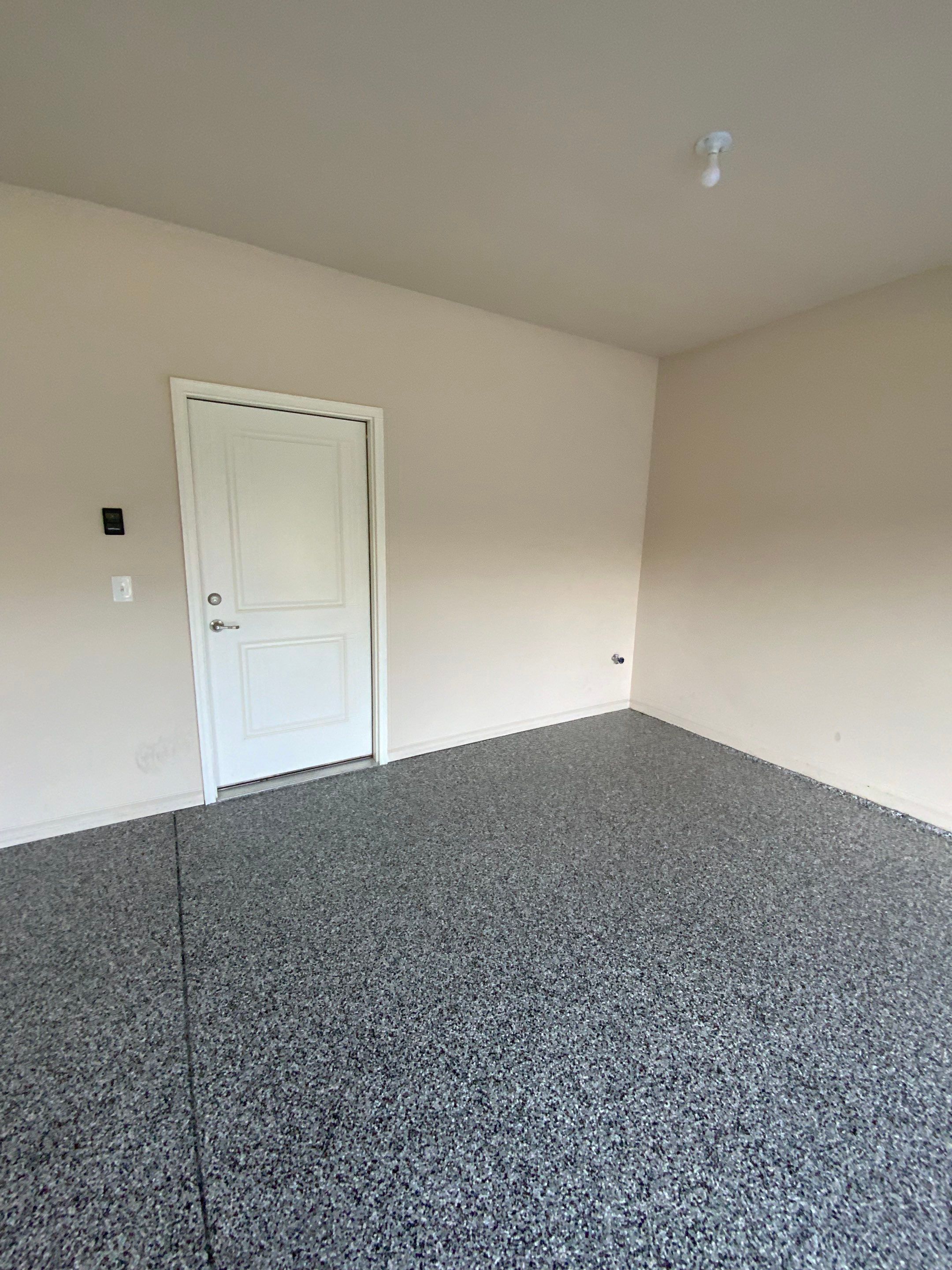 Garage coating and organization in Mishawaka!  by Innovative Spaces / Innovative Concrete Coatings