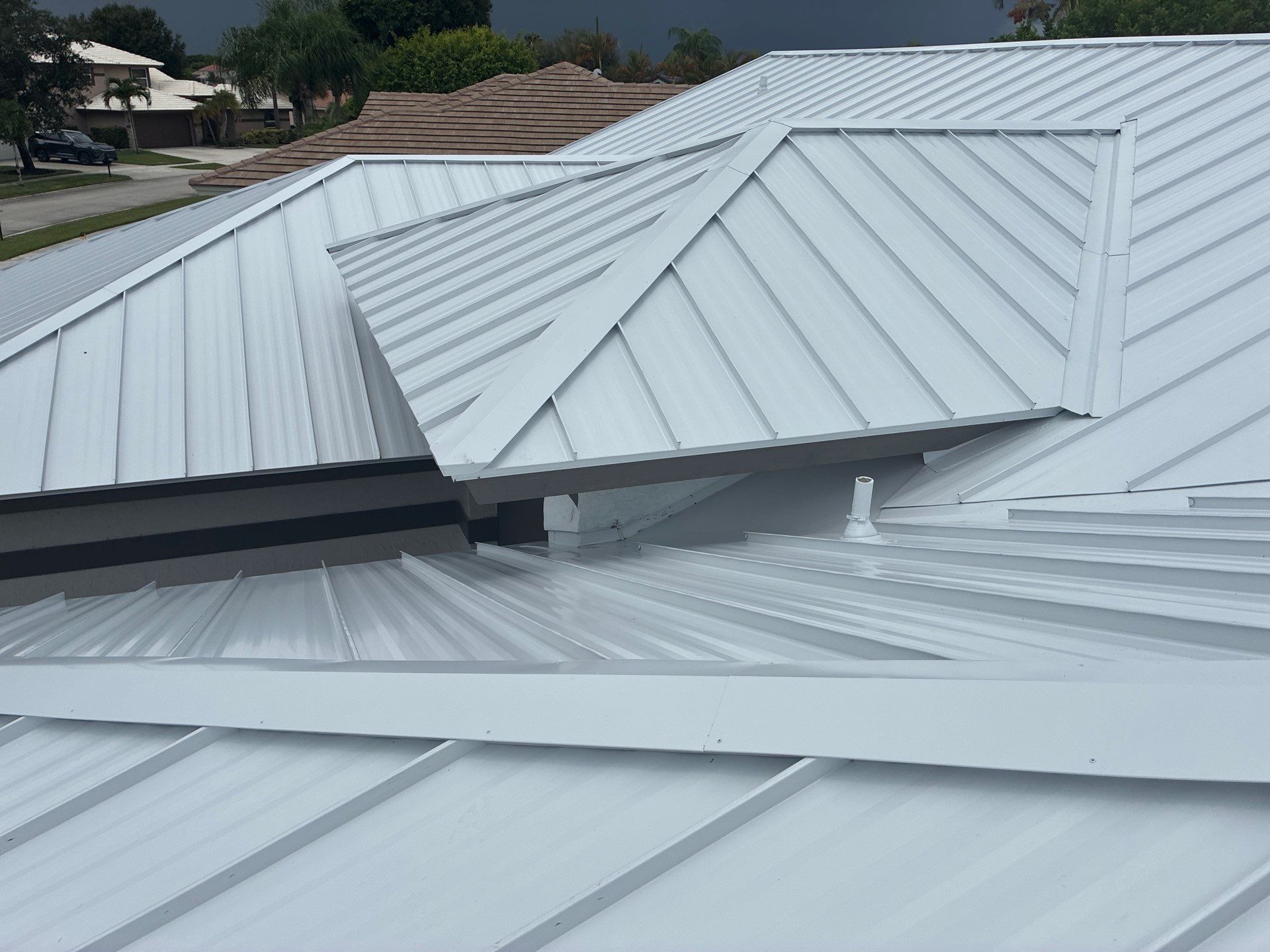 24ga 1.5" Mechanical Seam Regal White  by Total Roofing System The Metal Roof Experts