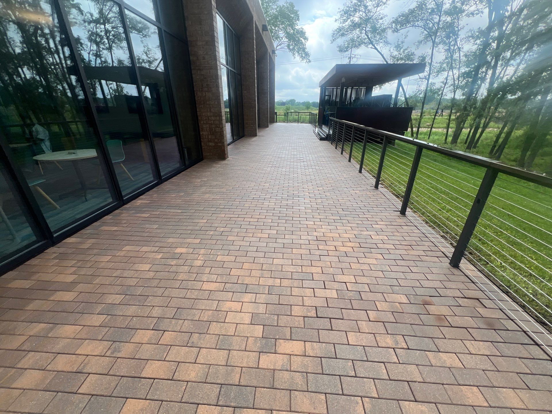 Brick paver repair, cleaning, sealing and poly sanding by Northern Power Washing LLC.
