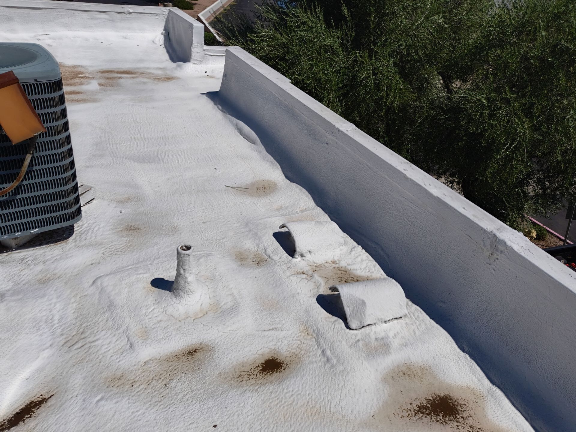 Mesa Apartment Flat Roof Coating and Interior Restoration Services by APM Builders LLC