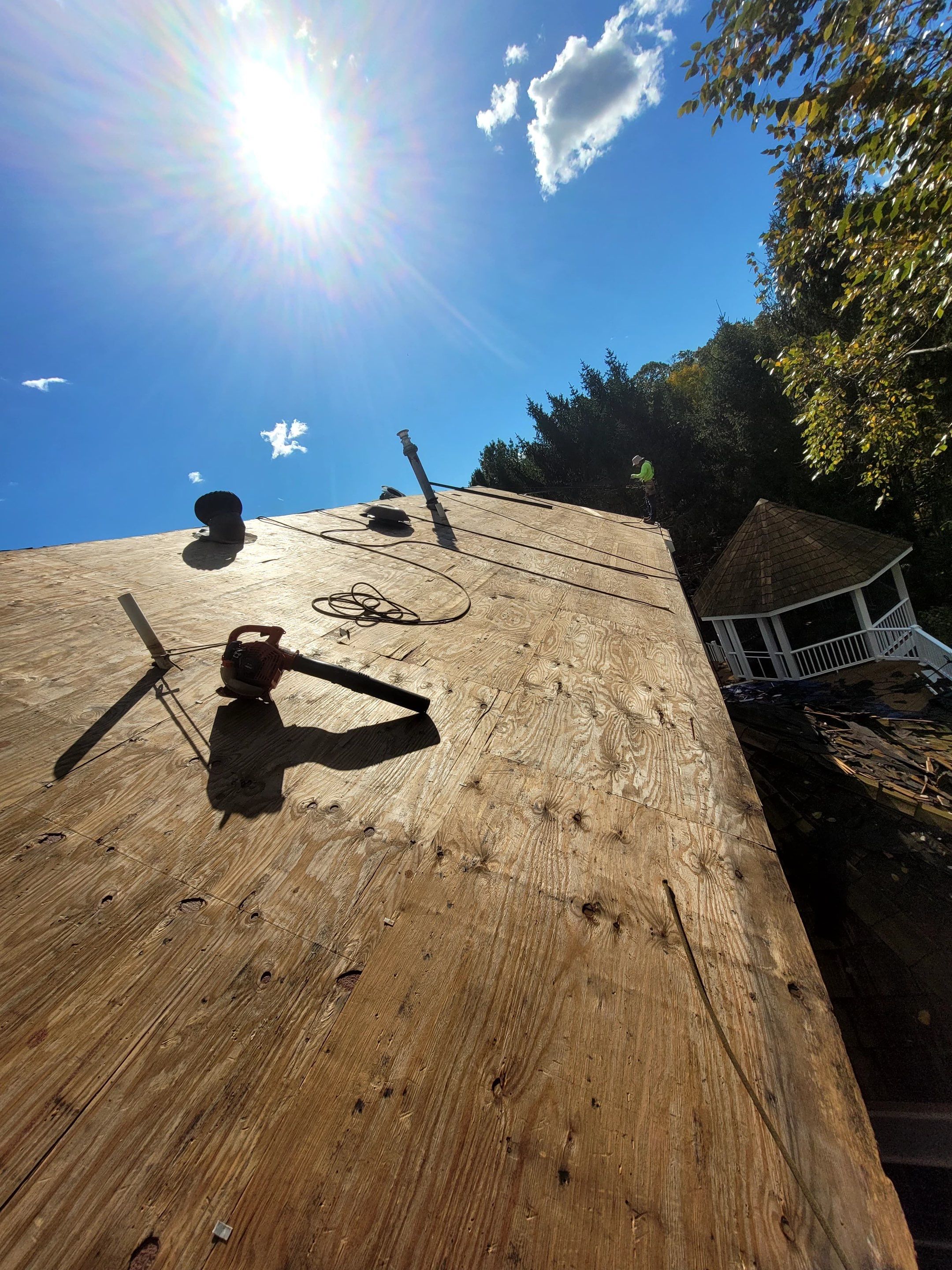 Sleek Tesla Solar Roof Installation by American Home Contractors