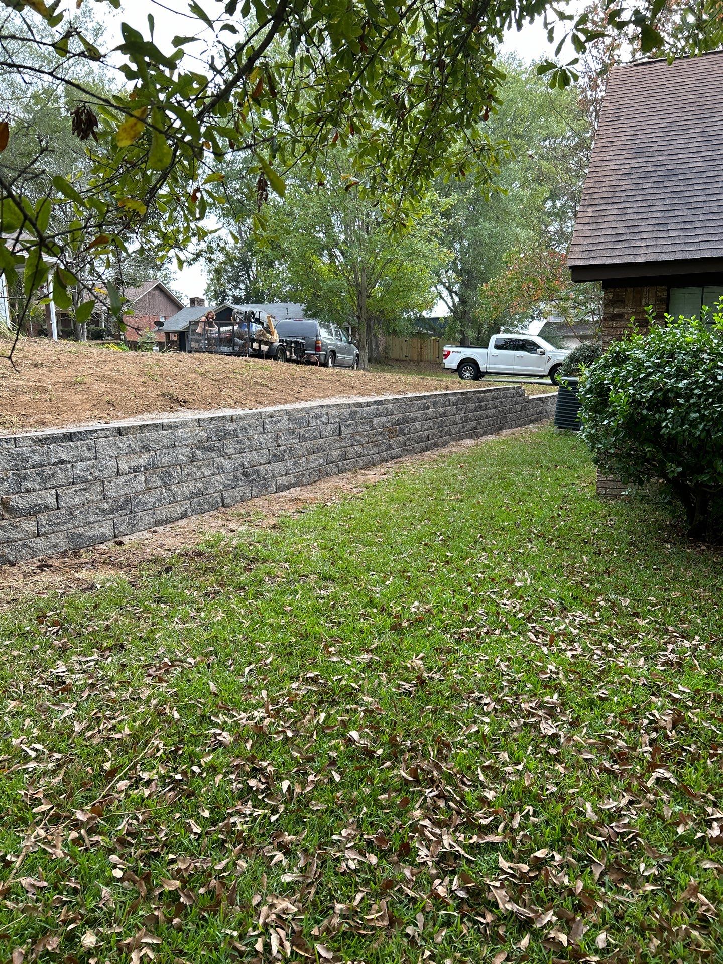 Elegant Stone Retaining Wall by Roberson Construction LLC