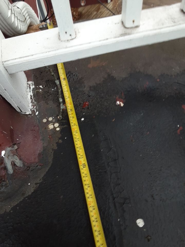 Residential Roof Replacement using Patio Roof by Absolute Roofing and Construction
