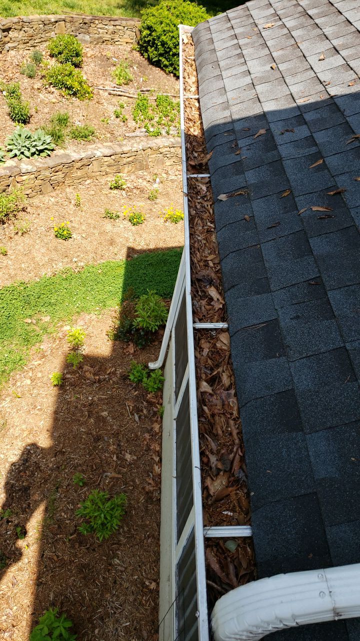 Gutter Cleaning using water by Power Wash Masters LLC