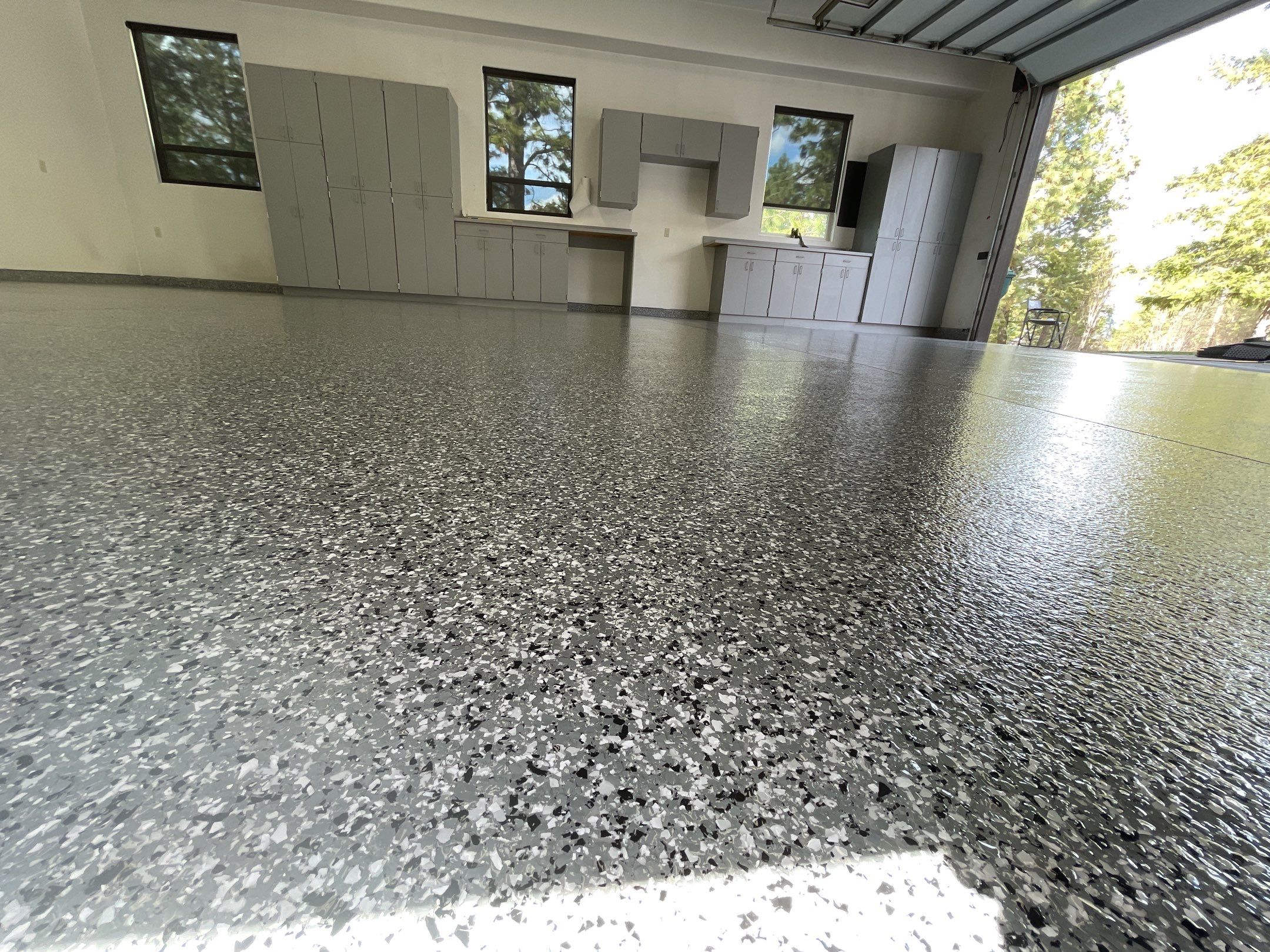 Garage Transformation using Smoke and the Penntek Evolution System by Croc Coatings, LLC